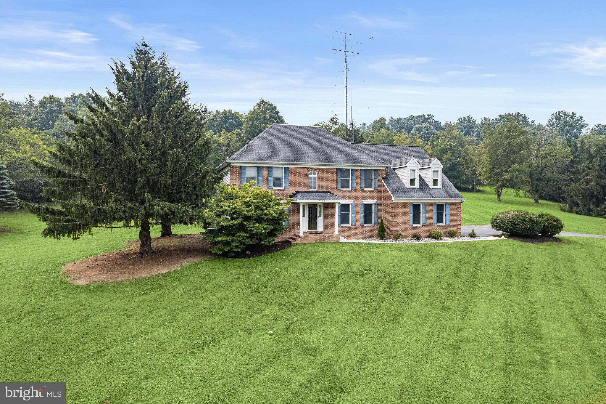 Welcome home to this beautiful 4-bedroom, 2.5-bath residence offering the perfect blend of comfort, style, and space. Situated on 3.5 scenic acres, this home features an inviting open layout designed for both everyday living and entertainment. 

The spacious kitchen flows seamlessly into the formal dining room and breakfast nook, creating the perfect gathering space for family and friends. The main level also offers two versatile bonus rooms, ideal for a home office, playroom, or hobby space. Relax in the cozy living room featuring a beautiful fireplace.

Upstairs, you'll find four generously sized bedrooms, including a luxurious primary suite with an updated spa-inspired bathroom featuring a soaking tub, creating the perfect retreat after a long day. A charming loft overlooks the living space and provides additional room for a reading nook, office, or lounge.

The lower level offers even more living space with an additional bonus room, perfect for a home gym, media room, guest space, or recreation area. Plenty of storage space. 

Step outside to enjoy the newly updated rear deck, overlooking the peaceful backyard and expansive acreage—ideal for entertaining, grilling, or simply relaxing while taking in the beautiful surroundings.

Additional highlights include:

4 Bedrooms | 2.5 Bathrooms

Updated primary bathroom with soaking tub

Spacious loft upstairs

Partially finished basement with bonus room

Two additional bonus rooms on the main level

Open kitchen with formal dining room and breakfast nook

Cozy fireplace in the living room

Laundry room on the main level

Spacious 2-car garage

3.5 acres of private outdoor space

Updated rear deck

This exceptional property offers the space, flexibility, and modern updates you've been looking for—all in the desirable Mount Airy location. Schedule your private showing today!