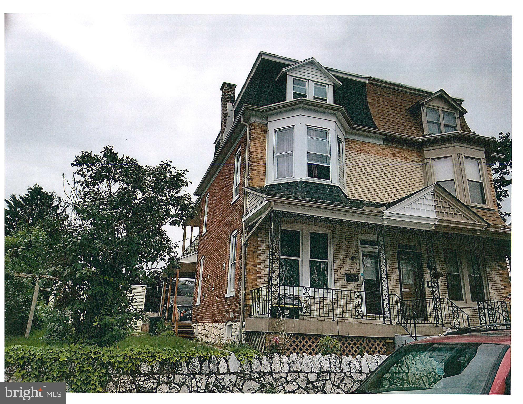 Great end unit in desirable West York Boro. location.  Extra large side yard.  Move in ready.  Large rooms.  5 bedrooms.  Cozy home renovated with nice features.  Big 2 car garage.  New roofs.  Priced to sell.