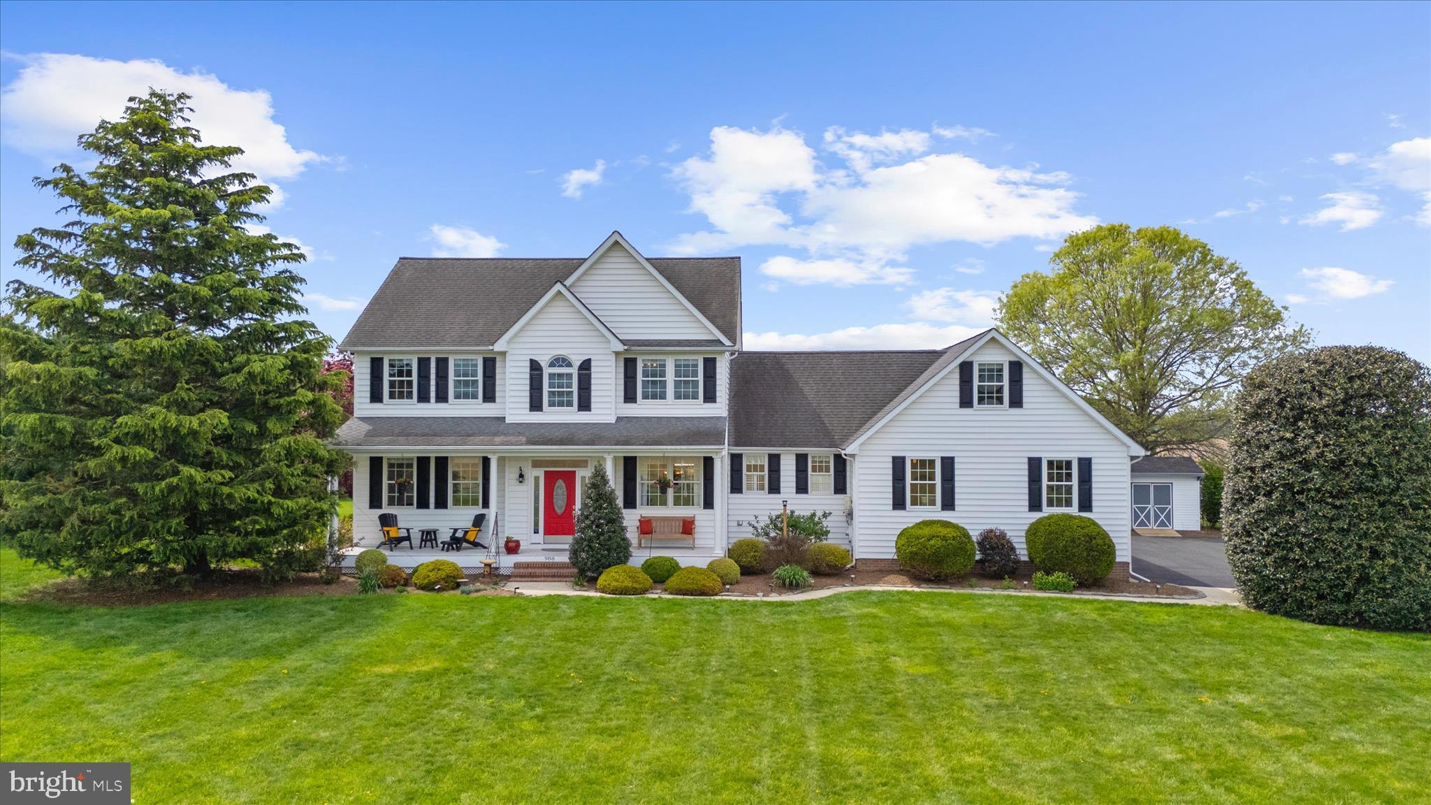Welcome to 988 White Marsh Road, where privacy, energy efficiency, and modern comfort come together on 1.37 unrestricted acres just outside of Centreville.

If you've been searching for a home that offers space, flexibility, and lower monthly ownership costs, this property deserves a closer look. Featuring 42 owned (not leased) solar panels, private well and septic, and no Centreville town taxes, this energy-efficient home offers the opportunity to enjoy lower monthly utility expenses and greater long-term savings while still being just minutes from downtown Centreville.

Surrounded by open countryside and mature landscaping, this beautifully maintained home offers over 2,600 square feet of living space with no HOA and no restrictive covenants. Enjoy the peace and quiet of Eastern Shore living while remaining close to Historic Centreville, shopping, dining, parks, the Centreville Wharf & Public Landing, and an easy commute to the Bay Bridge.

Inside, you'll find a spacious and functional floor plan designed for modern living. The inviting family room features a propane fireplace and flows seamlessly into the kitchen and dining area, creating the perfect gathering space for family and friends. The kitchen is equipped with stainless steel appliances, a tile backsplash, ample cabinetry, and abundant natural light.

Additional main-level living spaces provide flexibility for entertaining, hobbies, or working from home, while the mudroom, laundry room, and half bath add everyday convenience.

Upstairs, the primary suite serves as a private retreat with a spacious walk-in closet and en-suite bath. Three additional bedrooms, a full bath, and a large bonus room over the garage offer versatile space for a home office, gym, media room, playroom, or guest accommodations.

Step outside to enjoy the lifestyle that makes Queen Anne's County so desirable. Relax on the welcoming front porch, entertain on the maintenance-free rear deck, or simply enjoy the privacy and open space of your expansive backyard. Whether you're gardening, hosting gatherings, or enjoying the peaceful surroundings, this property offers room to live the way you've always imagined.

Recent improvements include fresh interior paint (2026), a repaved driveway (2026), updated kitchen appliances (2025–2026), a new heat pump (2024), a new well pump and expansion tank (2024), Thompson Creek replacement windows (2021), an updated sliding glass door (2021), and a whole-house water filtration system with reverse osmosis.

For buyers relocating to Maryland's Eastern Shore, 988 White Marsh Road offers a rare combination of privacy, acreage, energy efficiency, lower ownership costs, and convenient access to everything Queen Anne's County has to offer.