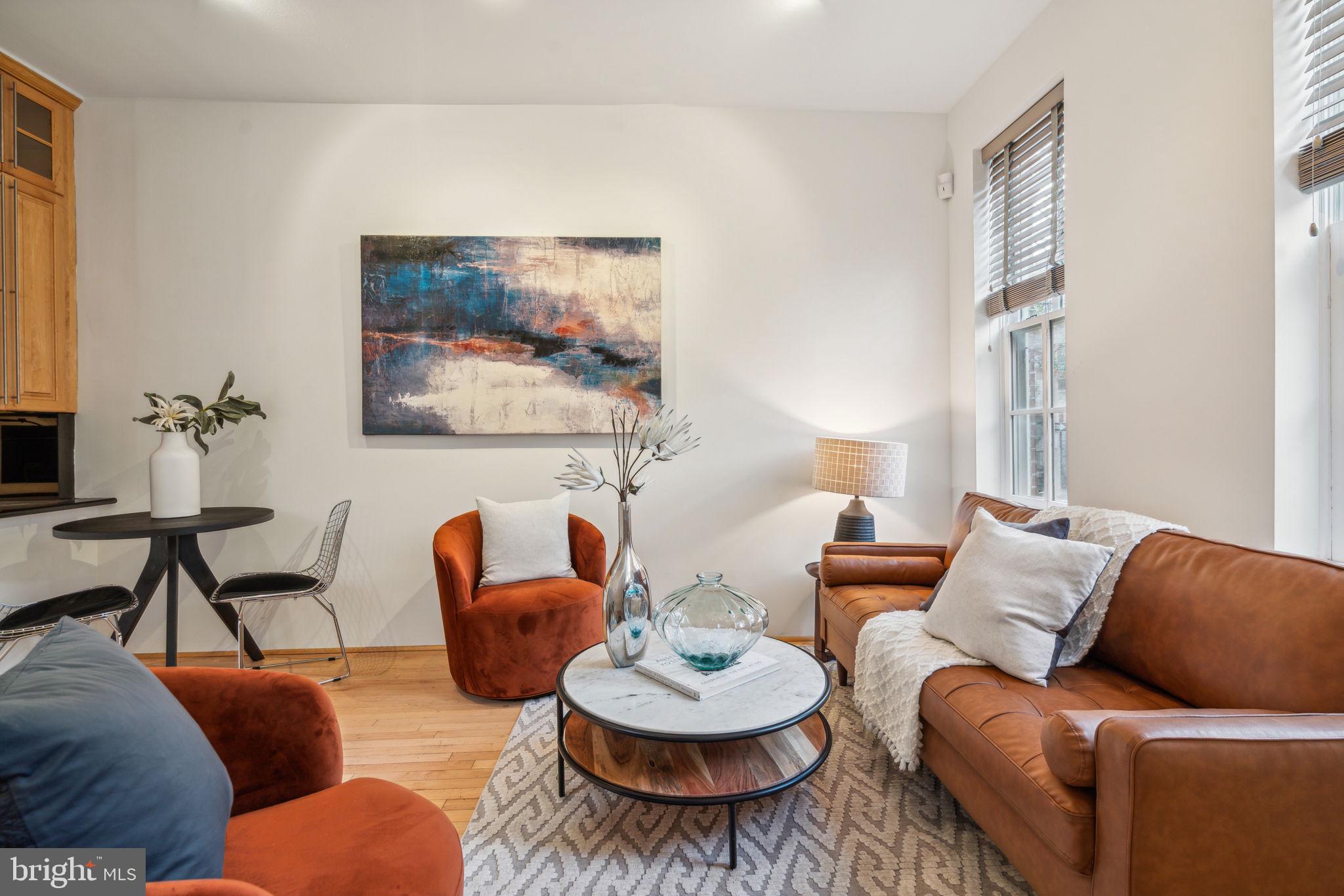 Exceptional 4 story Rittenhouse Square corner home with 2 beds, 2.5 baths, den, rear deck and PARKING!! Enter into the first level which is ideal for dining, entertaining or relaxing with a gourmet galley style kitchen and door out to your very own rear parking spot! Next level up is the main living space with fireplace, wetbar, powder room and door out to charming rear deck. The third level is a primary bedroom suite with an extra large walk in closet and luxurious primary bath. Fourth floor hosts another bedroom, an office area and a second full bath. This wonderful home is in a prime location, just off of 18th & Pine and is convenient to every cafe, bar, shop, business and restaurant that you can dream of! Hurry up and shedule your showing today ! (Please note that some photos have been digitially staged/edited).