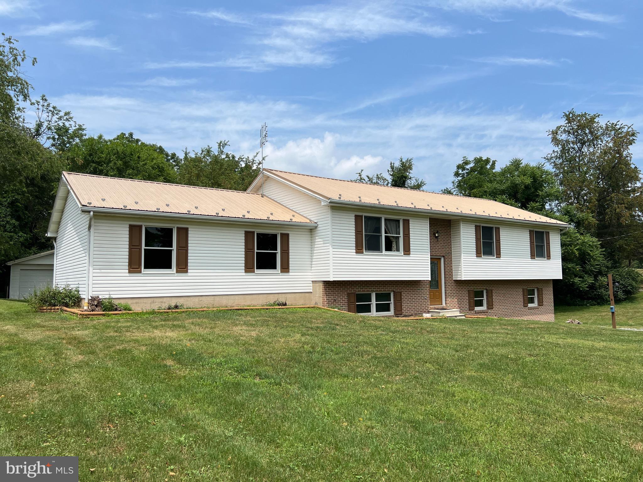 Country setting between Shippensburg and Newville! Situated on 2.21 acres, this one owner bi-level could be your new home! 3 bedrooms with 2 full baths and an unfinished lower level ready for your ideas.  2 car garage in addition to the one car on the lower level plus the addition of a 2 car workshop with 220. Covered deck on the rear. Metal roof in '21. Great opportunity for the right vision.
