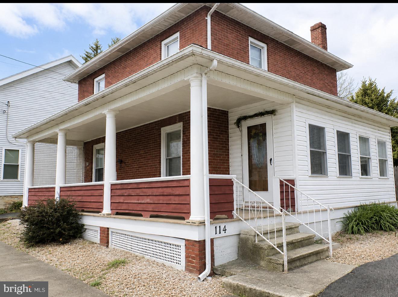 Charming and well-maintained 2-story brick home located in the heart of McConnellsburg! This inviting property offers timeless character with spacious covered wraparound porch, off-street parking, and a functional layout throughout. The home features a bright kitchen with updated stainless steel appliances, ample cabinetry, and cozy dining space full of farmhouse charm. Spacious living areas offer hardwood flooring, abundant natural light, and comfortable everyday living.

Enjoy the blend of original character and tasteful updates while maintaining the warmth and charm of an older home. Outdoor spaces include a rear deck area, low-maintenance landscaping, and covered front porch perfect for relaxing evenings. Conveniently located near local shops, restaurants, and schools with easy commuter access.

A wonderful opportunity for buyers seeking charm, space, and small-town living!