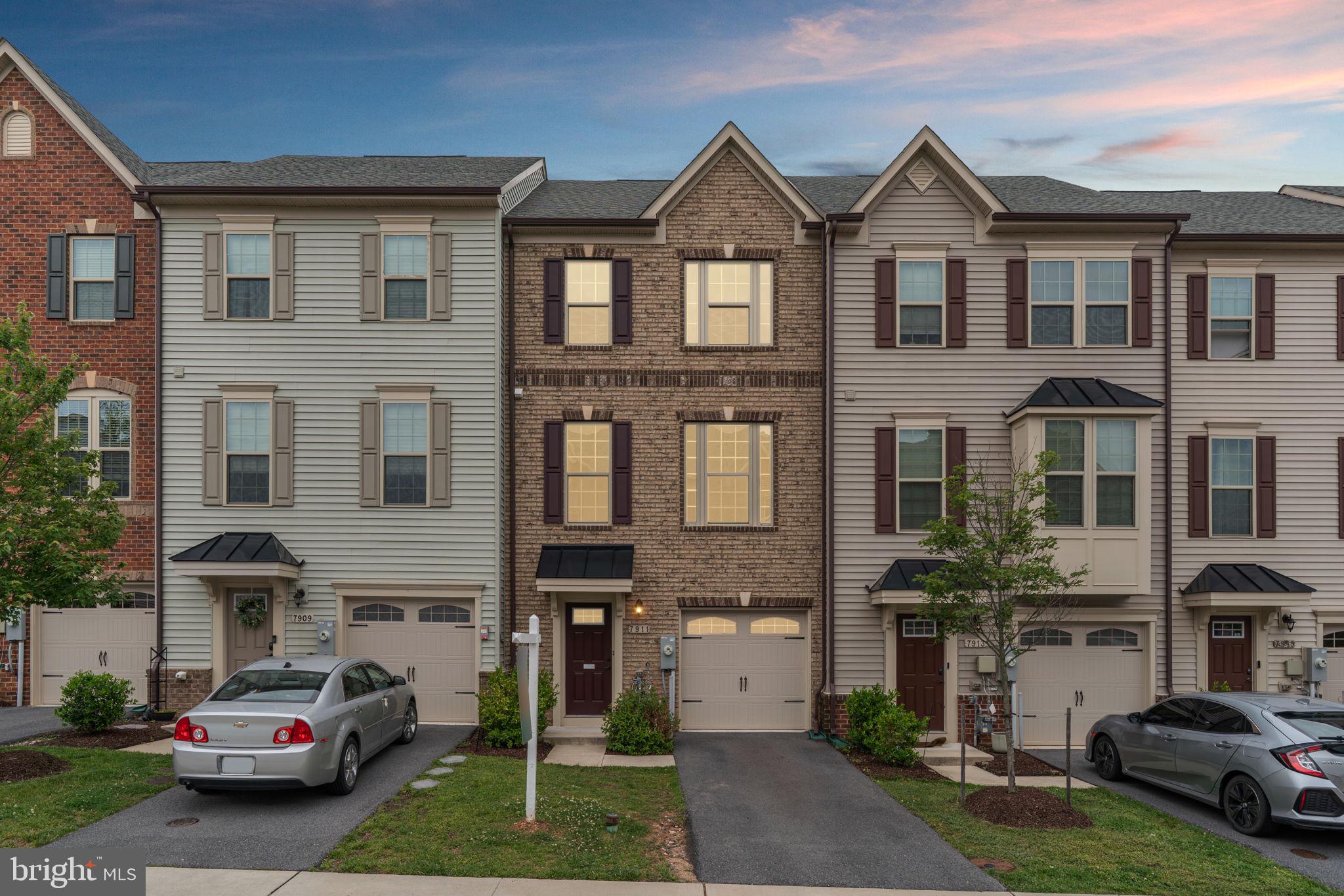 Welcome home to this beautifully upgraded 3 level townhome in the highly sought after Parkside community of Hanover! Built in 2021, this spacious Mozart model offers 2,520 square feet of finished living space with 3 bedrooms, 2 full baths, 1 half bath, a finished lower level, and attached 1-car garage.

The main level features an open concept design with stylish flooring, abundant natural light, and a stunning gourmet kitchen complete with white cabinetry, upgraded pantry shelving, gas cooking, stainless steel appliances, a large center island with seating, and generous counter space perfect for entertaining and everyday living. Just off the main living area, step outside to the oversized deck with steps leading to the yard, creating the perfect space for relaxing, grilling, or gathering with family and friends.

Upstairs, retreat to the spacious owner's suite featuring tray ceilings, a large walk-in closet, and an upgraded spa-inspired bath with dual vanities and an oversized shower with dual shower heads. Two additional bedrooms, an additional full bath, and convenient upper-level laundry complete the upper level.

The finished lower level provides flexible additional living space ideal for a recreation room, home office, gym, playroom, or media room. Additional upgrades throughout, 9-foot ceilings, and thoughtful design details make this home truly move-in ready.

Enjoy all that Parkside has to offer including a community pool, clubhouse, fitness center, walking trails, playgrounds, and convenient access to Fort Meade, Arundel Mills, shopping, dining, BWI, and major commuter routes.

Call today for details or your private showing!