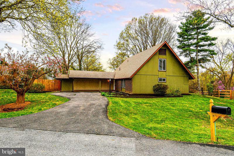 Don't Miss out on this lovely, sun filled Mid-century Modern A-frame home featuring 4 bedrooms and 2.5 bathrooms. The home has so much to offer, Fresh Paint 2025, Windows and Sliding Glass Doors replaced in 2021, Roof, Gutters and Downspouts 2021,  New Electrical Panel 2021, Hot Water Heater 2021, Upstairs bathroom remolded 2022, HVAC 2020, Roof 2020, large addition off the kitchen,  a spacious living room with a glass door opening to the yard, separate dining room, perfect for family and holiday dinners, updated kitchen with white cabinets, granite counter tops and stainless-steel appliances. The upper level offers and additional Family/Bonus Room with ample storage, 2nd Owners Suite with walk-in closet and beautifully renovated bathroom! This Contemporary home offers amazing spaces, along with a front porch featuring brick flooring and driveway for multiple cars, storage shed, additional exterior storage and a fabulous yard. The community offers many amenities, a large pool with lap lanes and dive well, very active swim and dive teams, horseshoes, cornhole, volleyball with sand courts, baby pool with covered awning, snack bar, covered pavilion with picnic tables, tennis courts, walking paths and so much more! Minutes to the local Recreation Center, Olney Library, restaurants, shopping, the ICC and Metro, this home is a rare find.
