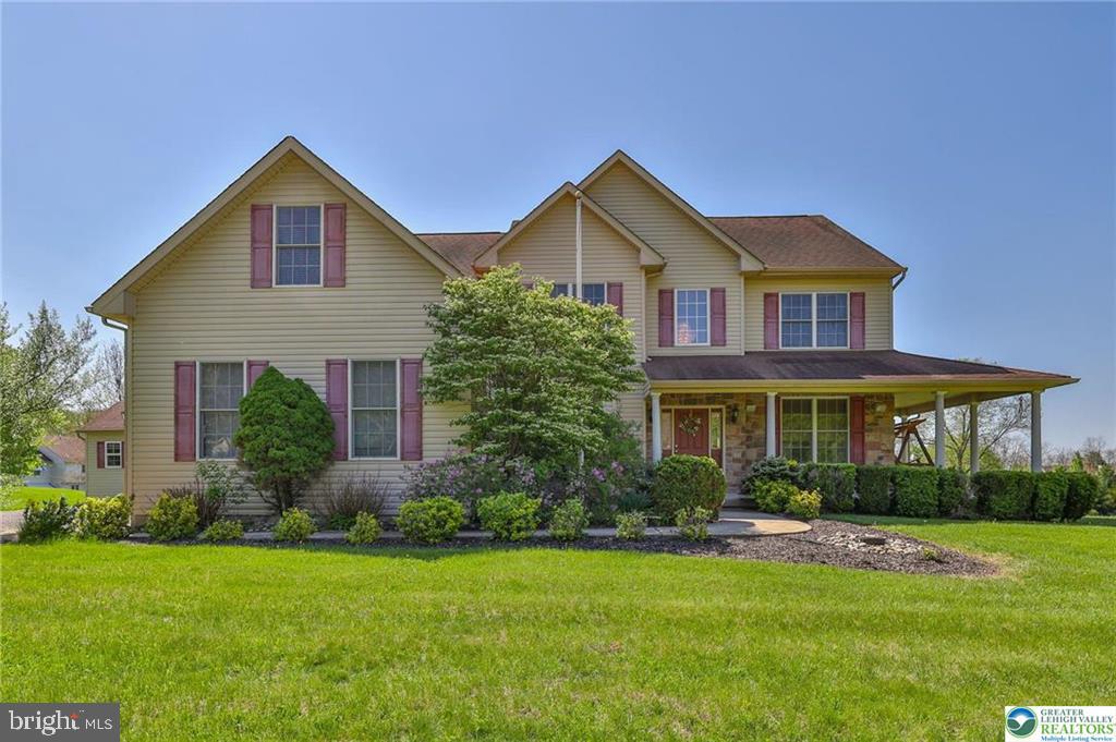 Welcome to Spring Hill in highly desirable Springfield Township, located within the acclaimed Palisades School District. This exceptional home offers over 3,500 square feet of thoughtfully designed living space in one of the township’s only modern, walkable neighborhoods complete with sidewalks and a true community feel. Step inside to discover a dramatic two-story great room anchored by a stunning stone fireplace, creating the perfect gathering space filled with natural light and timeless character. The spacious layout blends comfort and functionality with generously sized living areas ideal for both everyday living and entertaining. Outside, your private backyard retreat awaits with a beautiful in-ground pool and huge flat yard — perfect for summer relaxation, entertaining guests, or enjoying peaceful evenings at home. Combining modern neighborhood living, scenic surroundings, and convenient walkability , this is a rare opportunity to own in one of Springfield Township’s most sought-after communities.NOTE: New AC compressor and HW heater installed Spring 2026.  Call for your private showing today.