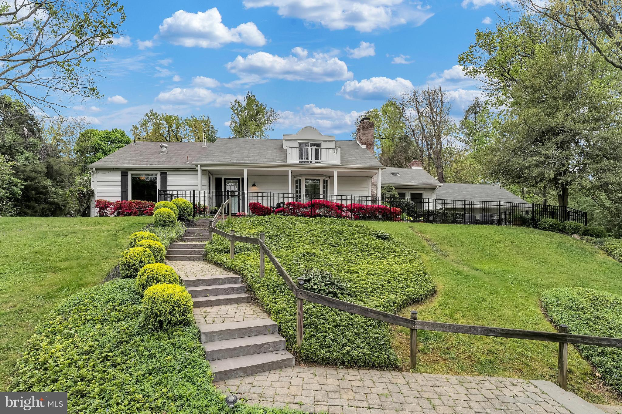 Welcome to 9619 Kingston Road, a beautifully renovated home situated on an unparalleled lot in the heart of Rock Creek Hills. The first floor features a  formal living room and a spacious gourmet kitchen which opens  to the show stopping family room. The family room boasts a vaulted ceiling, custom bookcases and a gas fireplace. The main level primary suite features an Elfa walk-in closet and  a spa like bath.  Another bedroom/office and a powder room complete the first level. The second story features three huge bedrooms, a full bath and abundant storage. The finished lower level offers ample space for play, another full bath, laundry and more storage.  Additional features include an oversized garage, attic, 5 year old windows, a whole house generator, more Elfa closets and hardwood floors. This perfect package is complete with expansive front and back brick patios that overlook the beautiful, three-quarters of an acre lot. Welcome home!