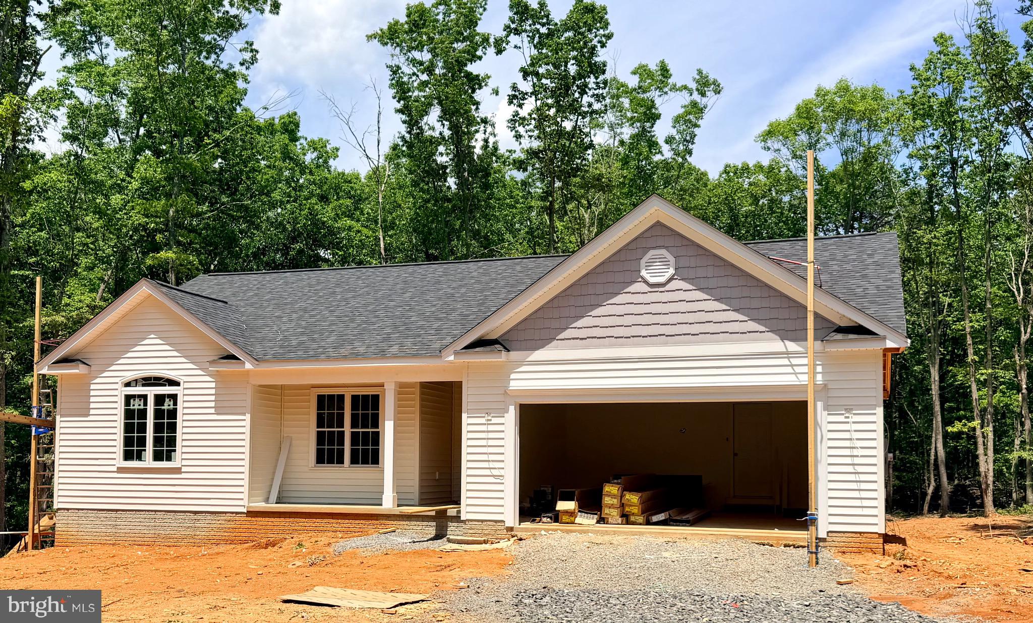 LATE JULY COMPLETION! CHARLESTON II MODEL - LOT 6- Located on a lovely 4.84 acre mostly wooded lot. Home will include an open floor plan with Stainless Steel Appliances and Granite Counter Tops in kitchen, Cultured marble vanity tops in the bathrooms, Covered front porch, Unfinished Basement with bathroom rough-in for future expansion and a 2 car garage. Call for more information or to schedule a showing! Road Maintenance Agreement. FYBERLYNC Available! Please call Fiberlync for more information and confirmation.