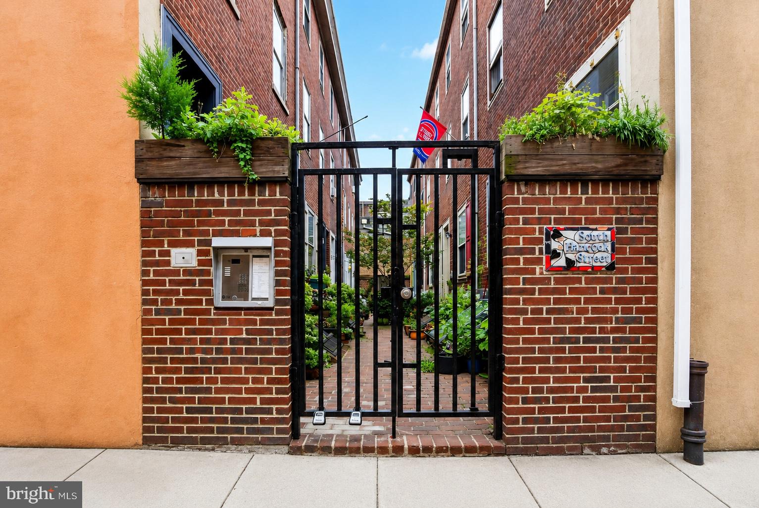 Welcome to Hancock Court, one of Philadelphia's most charming and picturesque hidden courtyards, ideally nestled on the border of historic Queen Village and Society Hill. Surrounded by mature trees, lush landscaping, and a welcoming community of just ten homes, this beautifully expanded two-bedroom, one-bath trinity offers a rare combination of timeless character, thoughtful updates, and an unbeatable location.

Step inside to discover a warm and inviting living room featuring soaring ceilings, beautiful original solid oak hardwood floors, custom built-in shelving, and a stunning wood-burning brick fireplace. The kitchen offers 42-inch cabinetry, new stainless steel appliances, hardwood flooring, and direct access to a charming outdoor area—perfect for grilling, gardening, or simply enjoying your morning coffee.

The second floor opens to a hallway, providing true privacy between the bedrooms—a rare and highly desirable feature for a trinity home. The front bedroom is filled with natural light and features original hardwood floors and a large closet. A beautifully appointed full tile bath showcases custom tiles created by a ceramic artist, a large vanity, an oversized window for abundant natural light, plus both a deep hall closet and separate linen closet for exceptional storage.

The third floor is dedicated to a bright and airy primary bedroom, complete with beautiful oak hardwood floors, east- and west-facing windows that welcome the morning and evening sun, a spacious closet with custom built-ins, and a peaceful atmosphere overlooking the charming courtyard.

The full basement offers impressive ceiling height, a skylight, side-by-side washer and dryer, and abundant storage space. Recent improvements include new fresh paint, a new hot water heater (2025), new heating/air conditioning system (2022), a new sewer line (2025), and brand new stainless steel kitchen appliances, providing peace of mind for years to come.

Life at Hancock Court is about more than just the home—it's about the lifestyle. This intimate courtyard community is known for its friendly neighbors, beautifully landscaped common area, and storybook setting that feels tucked away from the City while placing you just steps from everything that makes Queen Village and Society Hill so desirable. Enjoy award-winning restaurants, neighborhood cafés, boutique shopping, Penn's Landing, scenic parks, and the beloved Head House Farmers' Market, all just around the corner.


Rarely does a home offer this much charm, character, privacy, and community in one of Philadelphia's most sought-after locations. If you've been searching for an authentic Philadelphia home with timeless appeal and an extraordinary setting, your search ends here.