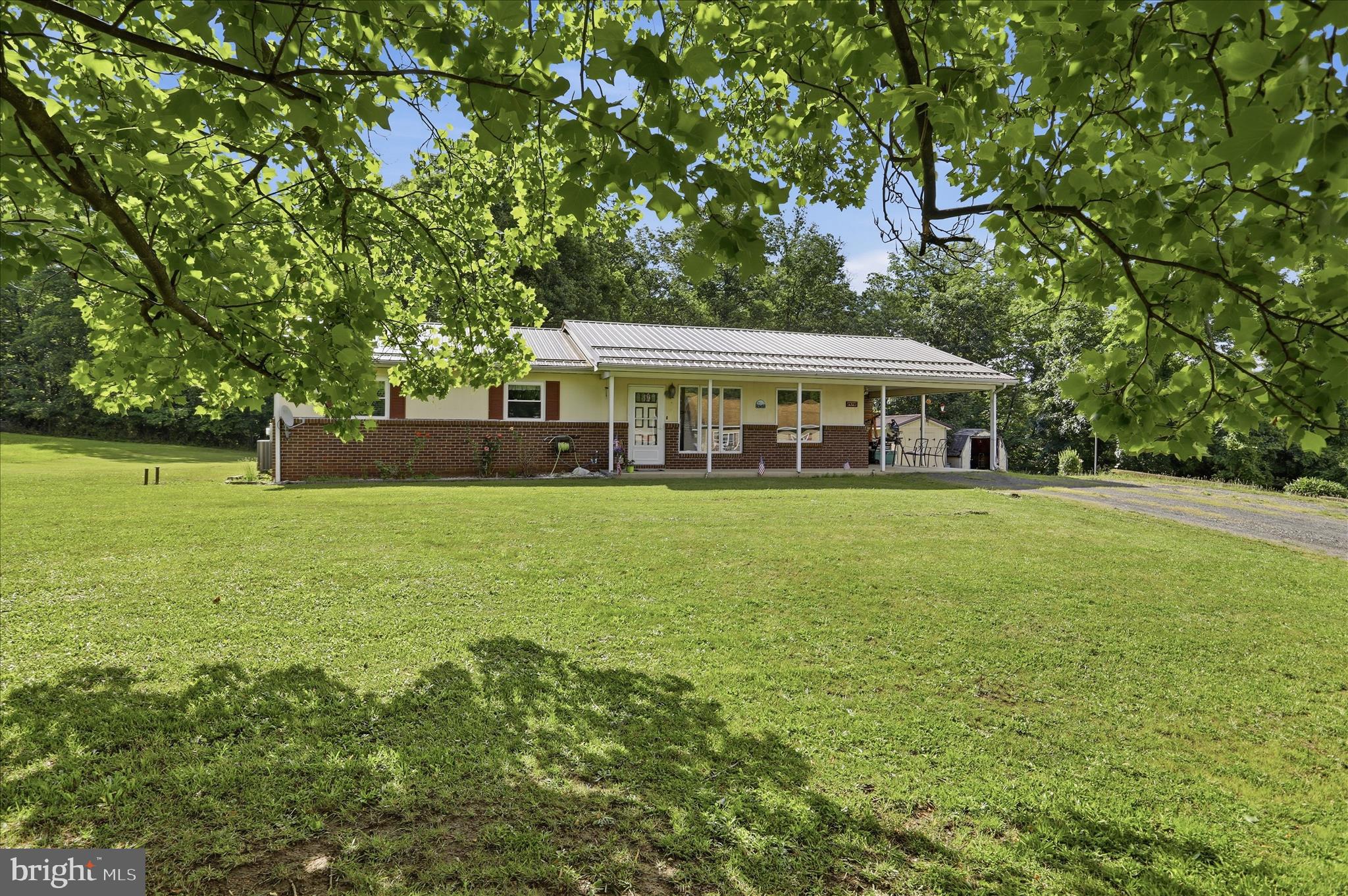 Discover timeless quality and exceptional care in this beautifully maintained brick ranch residence. Positioned on a level, nearly one-acre homesite, this impressive property offers 3 bedrooms, 2.5 bathrooms, and the convenience of one-floor living. A full unfinished basement presents outstanding opportunities for customization and future equity. The expansive grounds provide a picturesque setting with ample room for outdoor entertaining, recreation, and landscaping. Combining durability, space, and versatility, this home is the complete package.