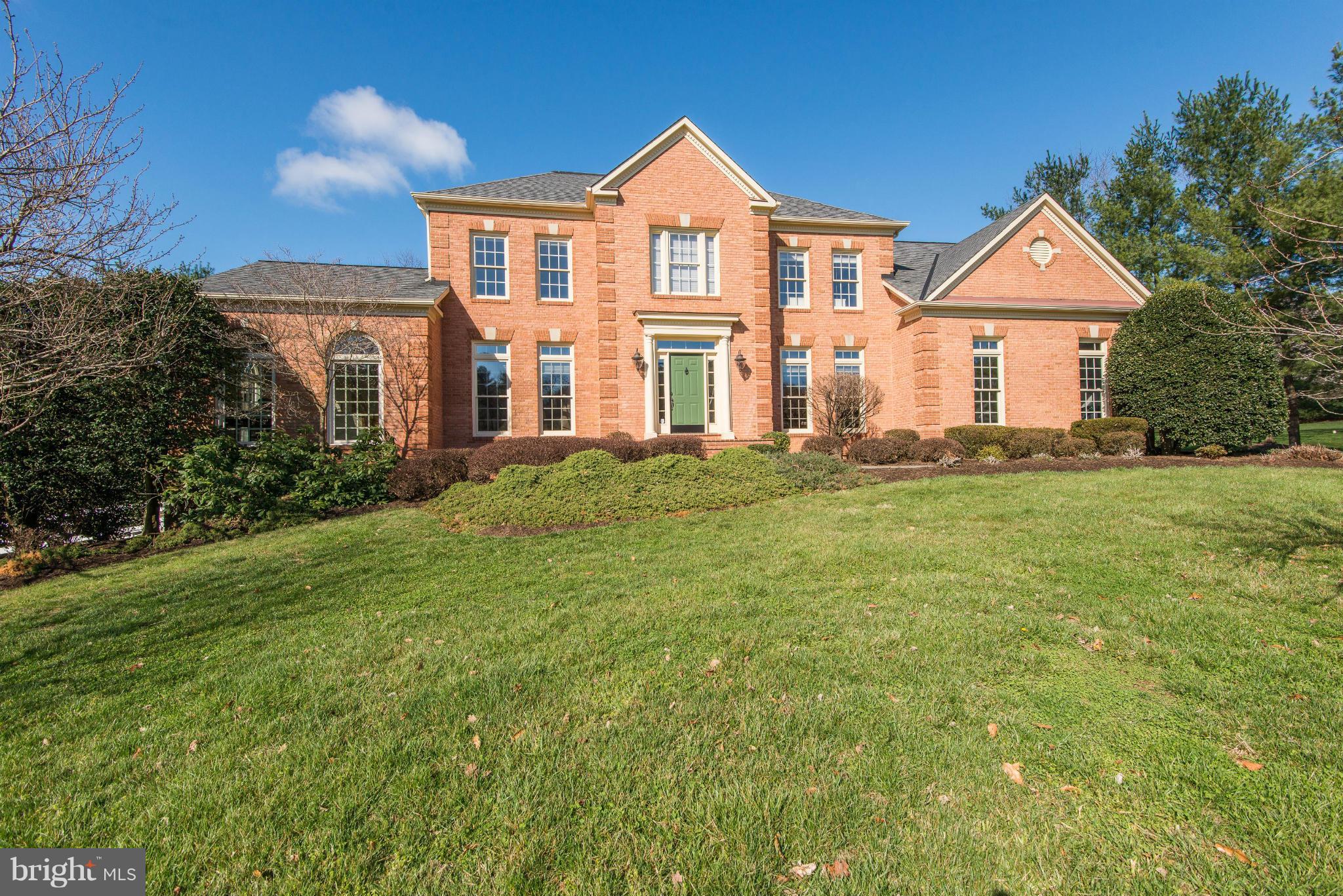 Stately mint condition colonial on gorgeous 1.75 private acre lot just minutes from Great Falls Village * Gracious two-story foyer, light drenched sunroom, library w/ built-ins, updated designer kitchen & baths * Hardwoods throughout main level * Walk-out lower level with full bath, rec room and more space to finish * Multi-level deck over looking pool & spa surrounded by lush landscaping