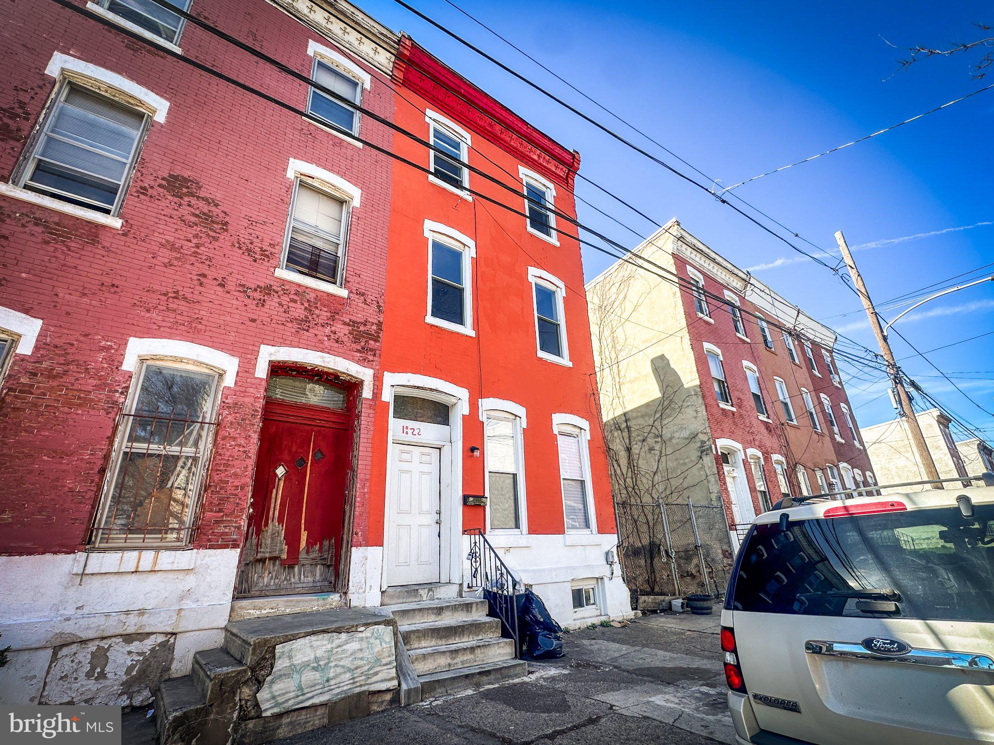 Welcome to 1822 N Van Pelt St — your rare opportunity to own a 6 bed, 2.5 bath, 2,700 sqft home PLUS an adjacent empty lot (list price does not include lot - inquire for details if interested) in Philadelphia’s rapidly growing Sharswood neighborhood! Whether you’re searching for your first home (ask how this home qualifies for up to $30,000 in grants and assistance for first-time Buyers), your next home, or a smart investment, this property checks all the boxes. Previously rented for $3,000/month, it offers immediate income potential for investors, while its size, layout make, and equity potential makes this home equally appealing for owner-occupants seeking space, flexibility, and long-term value (ask about utilizing the Limited FHA 203(K) Rehab option to finance your upgrades!). Completely renovated in 2018, entrance to the home greets you with generous living areas designed for both everyday comfort and entertaining. The first floor offers an open floor plan with high ceilings and recessed lighting throughout, a large eat-in kitchen, a convenient half-bath, and a dining area in the rear. With six bedrooms and two full baths through the second and third floors, the possibilities are endless—create dedicated home offices, guest suites, a gym, or multi-generational living arrangements. For investors, the strong rental history and proximity to Temple University make this an ideal addition to any portfolio, with consistent demand from students and young professionals. The layout is well-suited for shared living, maximizing rental potential. For homeowners, this is your chance to put down roots in a vibrant, appreciating neighborhood. Fredrick Douglas Elementary School is just half a block's walk north and Martin Luther King Rec Center just half a block's walk south. You’ll enjoy easy access to Cecil B Moore and Stephen Klein Wellness Center, plus the many restaurants, cafes, local shopping, and cultural attractions along Ridge Avenue, Broad Street and neighboring Brewerytown. Commuting is a breeze with ample on-street parking along this homes quiet block, in addition to enjoying convenient access to public transportation (SEPTA Bus Lines 3, 33, and 61).  Home is being sold in as-is condition. Don’t miss your chance to secure a high-potential property in one of Philadelphia’s growing neighborhoods—schedule your showing today!