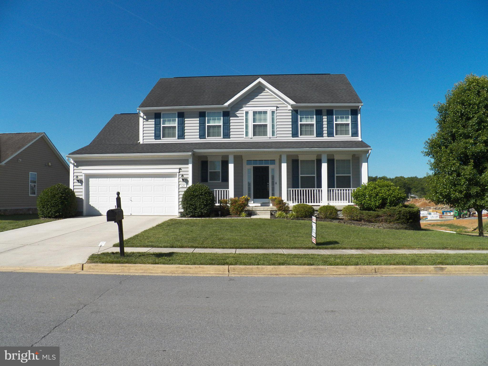 ***Stunning Colonial Home in Martinsburg's Premier Neighborhood***

Welcome to 121 Tarkay Place, a meticulously maintained 2-story colonial in the sought-after "The Gallery" neighborhood of Martinsburg, WV. This 4-bedroom, 3-bathroom single-family home offers 2,225 square feet of elegant living space on a .25-acre corner lot, built in 2013 with modern upgrades and timeless charm.

*Interior Highlights*

Step inside to discover beautiful hardwood, carpet, and vinyl flooring throughout. The spacious kitchen features cherry cabinets, a large center island, ample counter space, a large closet pantry, a breakfast nook and recessed lighting—perfect for both everyday living and entertaining. The master bathroom boasts an oversized soaking tub, a separate glass-enclosed shower with bench seating, a private toilet closet, and dual vanities.

Recent upgrades include a new HVAC system installed in 2023 and a Rainsoft water treatment system. The extra-large master bedroom includes double his & hers walk-in closets with custom shelving. Enjoy multiple living spaces including a large family room, formal living and dining rooms, and a laundry/mud room. Crown molding adorns the entire first floor, complemented by beautiful hardwood flooring in the entry foyer and powder room. The full unfinished basement is plumbed for an additional bathroom, offering great potential for customization.

*Exterior & Outdoor Features*

The home includes an attached 2-car garage with a concrete driveway, a rear deck, and a covered front porch. The professionally landscaped yard features flagstone borders, river rock, blooming shrubs, and trees, which enhance curb appeal but require minimal maintenance.

*Location & Community*

Situated minutes from I-81, shopping, restaurants, and the hospital, this home offers the perfect balance of convenience and tranquility. Located in a very quiet upper area of the neighborhood on a corner lot, enjoy beautiful sky, mountain and sunset views in a peaceful setting.
**This higher-end meticulously maintained home is ready for its next chapter. Contact us today to schedule a viewing and experience the comfort and convenience of 121 Tarkay Place.**
Agent Discloser - Listing agent is also an owner of this property.