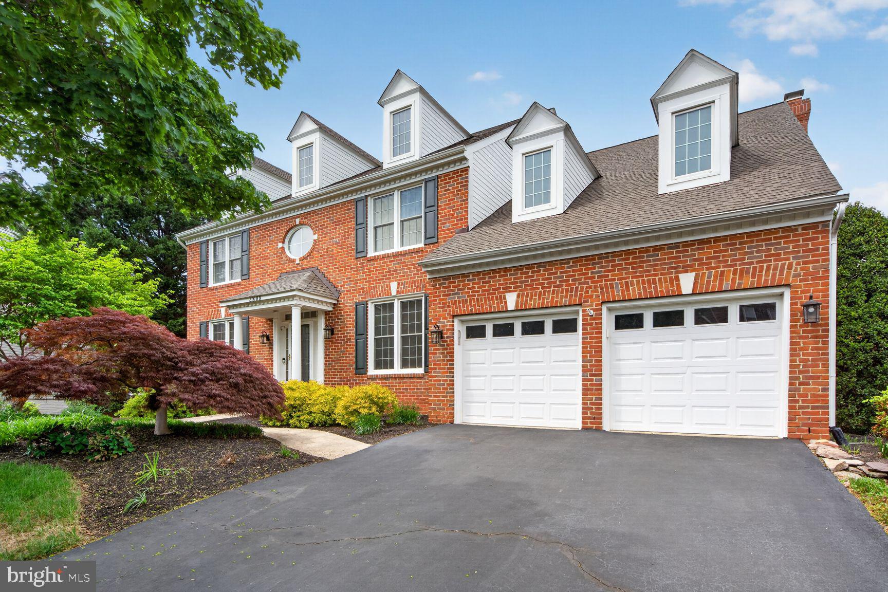 Open Friday 5/22 from 4 to 6 and Sunday 5/24 from 1 to 3.  Beautifully expanded and updated 5-bedroom, 4.5-bath home offering over 5,200 sq feet ofexceptional space, design, and unique architectural charm. The only home in the neighborhood featuring five decorative dormers, this property stands out with unmatched curb appeal.  A rare 3-foot rear extension enhances the dining room, kitchen, family room, primary suite, additional bedrooms, and lower level—creating one of the largest and most functional layouts in the community.  The chef’s kitchen, fully renovated in 2022, features a large center island with cooktop vented outside, double-opening base cabinets, and elegant marble countertops, seamlessly connecting the kitchen, breakfast area, and family room—perfect for entertaining and everyday living.
The main level features 10 foot ceilings and includes a private office/den with custom built-in bookshelves and cabinetry, along with an oversized formal dining room highlighted by a distinctive tray ceiling.  Hardwood floors throughout the mail level.
Upstairs, the spacious primary suite is oversized includes a beautifully remodeled bath (2020), plus, 2 walk-in closets and a sitting room.  The fully finished basement offers a large recreation room with floor length windows and entertainment area with wet bar, a 5th bedroom suite with 6-foot tub, french doors to the lower deck, second office or bonus room and oversized storage room.
Outdoor living is enhanced with an upper-level deck that leads to a second lower-level deck and fenced backyard.
Additional updates include new carpeting throughout all levels and stairs, and a brand-new roof installed in October 2024.  You have to see this lovely home.  It won’t last long.