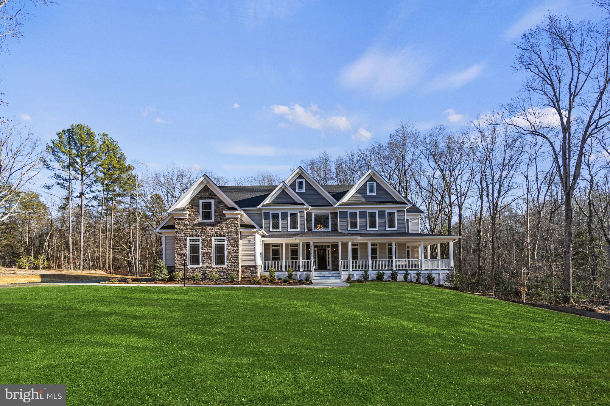 Stately Custom Grand Estate on 2 Acres with Dual Primary Suites

Welcome to this extraordinary custom grand estate home perfectly situated on 2 serene acres, offering luxury, space, and thoughtful design at every turn. With two luxurious primary suites, each featuring spa-like baths, this home provides the ultimate in comfort and flexibility for multi-generational living or private guest accommodations.

The heart of the home is a chef’s dream kitchen, equipped with high-end appliances, an oversized island, custom cabinetry, and a walk-in pantry—perfect for both everyday living and entertaining. The main level also boasts a private study, an elegant formal dining room, and a dramatic two-story family room filled with natural light and anchored by a stunning fireplace.

A bright and airy sunroom offers a relaxing retreat, while the upper level features three generously sized secondary bedrooms, each with their own private full bath, ensuring comfort and privacy for all.

The expansive full foundation basement includes a natural walkout, offering endless possibilities for future living space—whether it’s a home theater, fitness room, or in-law suite. The spacious side-load 3-car garage adds both convenience and curb appeal.

Tucked away in a peaceful setting yet close to major roadways, shopping, and dining, this impressive estate blends refined elegance with practical everyday living. A true masterpiece of craftsmanship and design—ready to welcome you home.