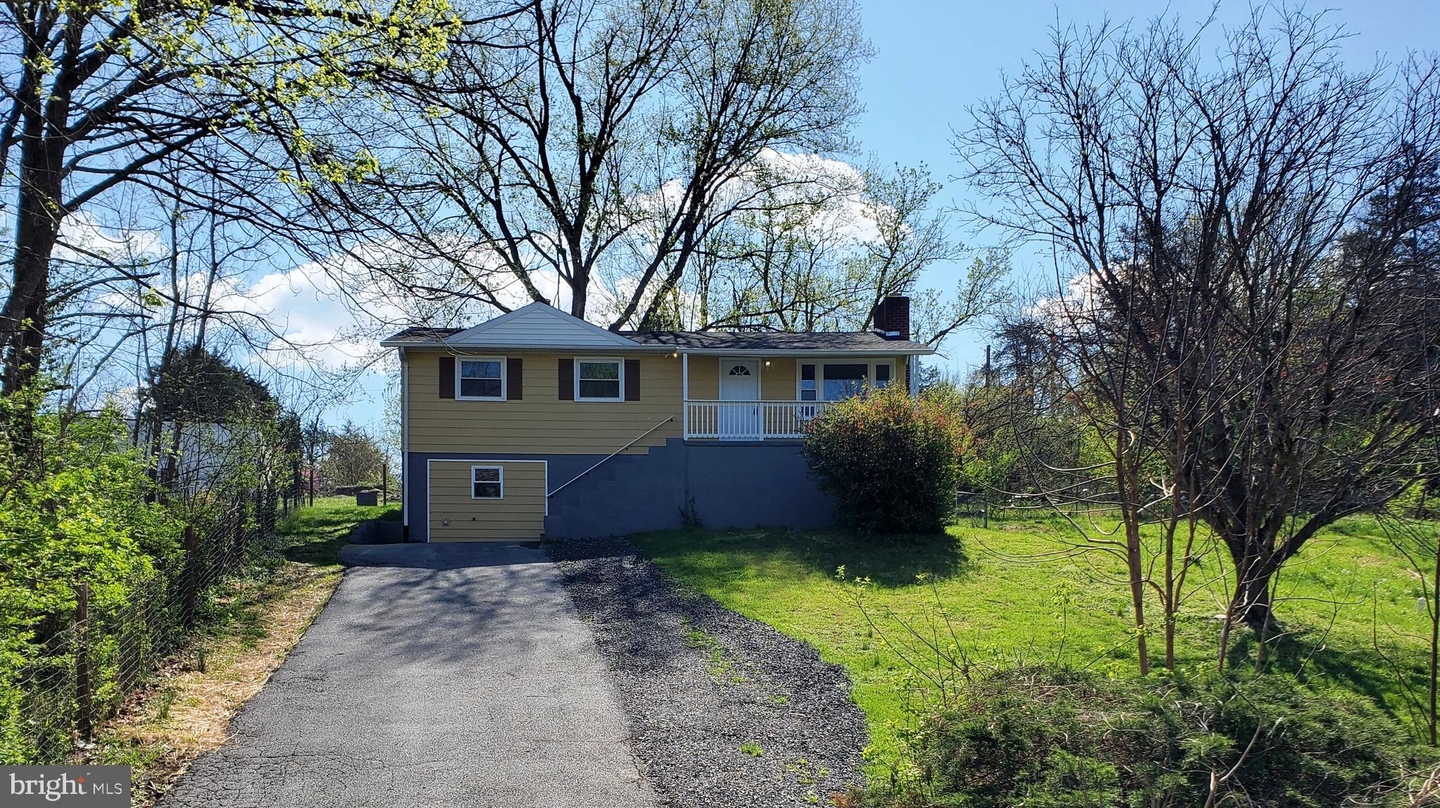 MOTIVATED SELLER!!  Renovated 4 BR, 2 BA raised rambler located on quiet road among the serenity of trees and wildlife along the North Shenandoah River.  No HOA.  Fireplace insert from Belgium in lower level.   Sit back and relax on the full length front porch or spacious back patio.  Traditional floor plan includes living room, family room, rec room, 3 bedrooms on the upper level with full bathroom and kitchen and as a BONUS lower level includes a 2nd kitchen and possible in-law suite(bedroom), office or home business.  Updated appliances, fixtures and granite counter in upper level kitchen.  Alternative septic system installed in 2024, serviced and PASSED inspection!  Roof replaced in 2022.  New water treatment system!  New pressure tank! Well pump and water tested and PASSED! 2x 50gallon AO Smith Signature Select hot water heaters.  Plenty of room for family and friends to visit or for a home business owner.   Schedule your showing today!