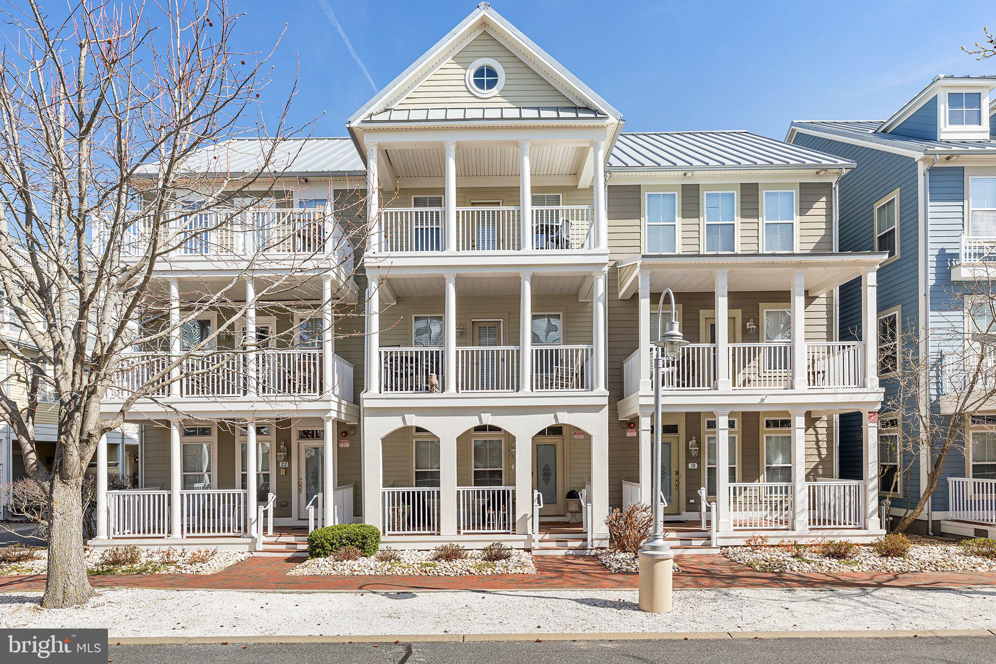 Discover Coastal Living at Its Finest in Sunset Island

Nestled on a quiet, tree-lined street in the heart of the highly sought-after Sunset Island community, this beautifully decorated townhouse is the perfect blend of comfort and coastal charm. Well  maintained, it’s being offered fully furnished—ready for you to move right in and start enjoying the beach lifestyle.

Step inside to an inviting open floor plan bathed in natural light. The modern kitchen is a chef’s delight, featuring solid surface countertops, a large island with seating, and sleek tile flooring. Adjacent to the kitchen, the spacious morning room is the perfect spot to sip your coffee and unwind with a good book. A cozy first-floor den provides flexibility as a potential fourth bedroom or home office.

Enjoy the coastal breeze from any of the three covered front porches or relax in the private screened-in rear porch. The master suite offers a spa-like retreat with a soaking tub, private balcony, and serene views. The stylish beach-inspired décor throughout creates a relaxed, welcoming vibe that you’ll love year-round.
Just steps from your door, Sunset Island’s resort-style amenities await. Take a dip in the outdoor pool, lounge at the private beaches, or explore the interactive fountain and fishing piers. The year-round clubhouse features an indoor pool, fitness center, and on-site restaurant. Stroll the scenic walking trails or stop by the Corner Store for a quick treat. With 24-hour security and a prime location close to Ocean City’s best attractions, this townhome is the ultimate coastal getaway.

Opportunities like this are rare—schedule your tour today before it's gone!