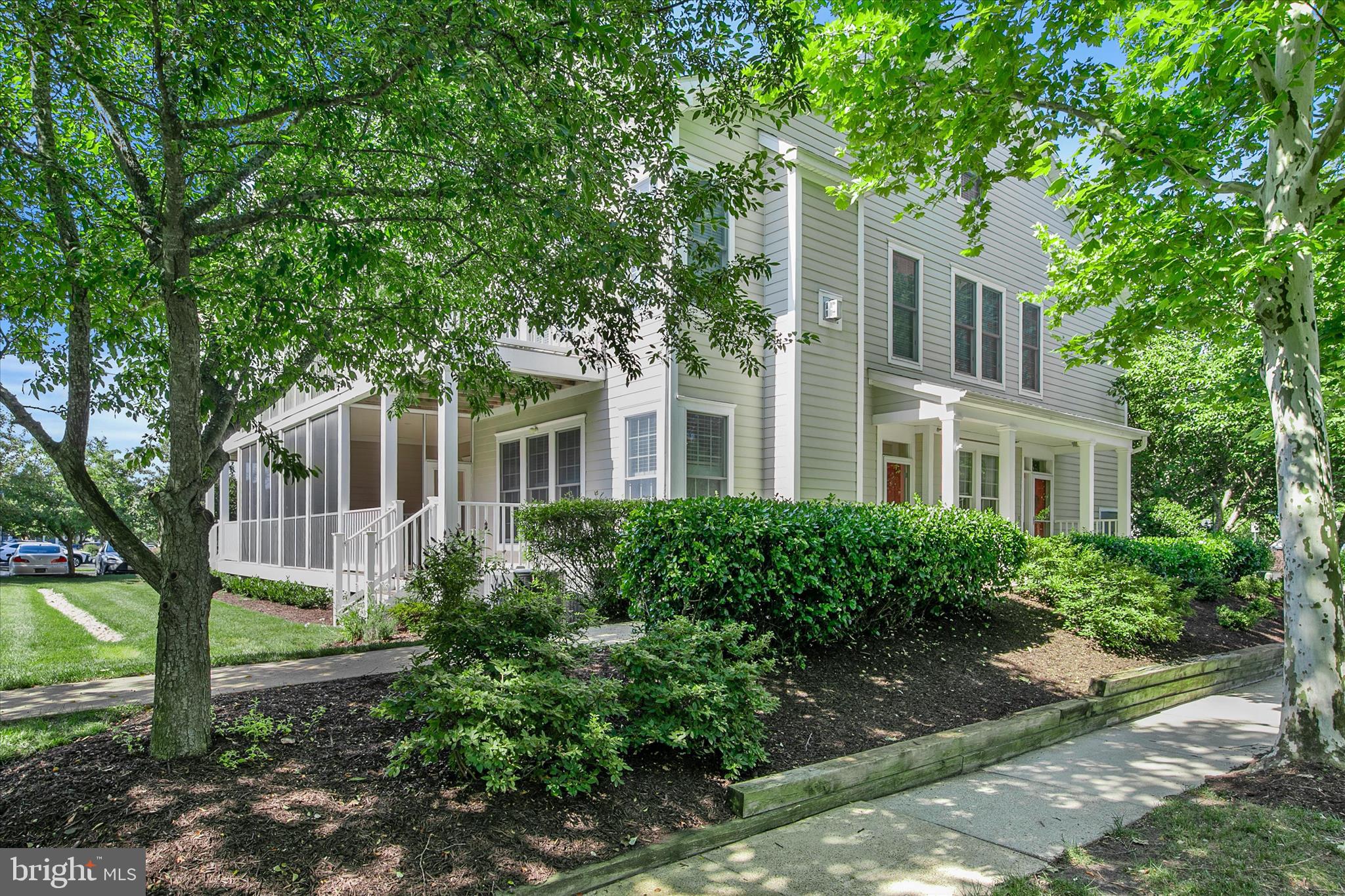 Tucked within the award-winning Bear Trap Dunes community in Ocean View, this inviting first-floor 3-bedroom, 2-bath end-unit villa captures the relaxed lifestyle that makes coastal Delaware so desirable. Surrounded by lush landscaping, this spacious golf villa offers the perfect blend of comfort, convenience, and resort-style amenities just minutes from Bethany Beach.

Inside, the bright and airy floor plan is designed for effortless everyday living and entertaining. The spacious living area features a cozy fireplace, abundant natural light, and direct access to a screened porch and private deck — creating the perfect setting for quiet mornings, summer evenings, or gathering with family and friends after a day at the beach or golf course.

The kitchen is thoughtfully designed with generous cabinet and counter space along with an open layout that flows seamlessly into the dining and living areas, making it easy to stay connected while entertaining or enjoying relaxed coastal living. The spacious primary suite offers a peaceful retreat with a walk-in closet, balcony access, and an en suite bath featuring double vanities, ceramic tile, and a soaking tub. Two additional guest bedrooms and a well-appointed guest bath provide comfortable accommodations for family and visitors alike.

As an end-unit, the home benefits from additional windows and natural light, while desirable first-floor living means no stairs to navigate. Whether you’re searching for a year-round residence, vacation getaway, or coastal investment opportunity, this property offers an exceptional combination of location, space, and lifestyle.

Bear Trap Dunes is known for its exceptional amenities, including a championship 27-hole golf course, indoor and outdoor pools, fitness center, tennis and pickleball courts, clubhouse, walking trails, and seasonal beach shuttle service to Bethany Beach. Conveniently located near beaches, dining, shopping, marinas, and entertainment, this home delivers the very best of coastal resort living in one of Ocean View’s most sought-after communities.