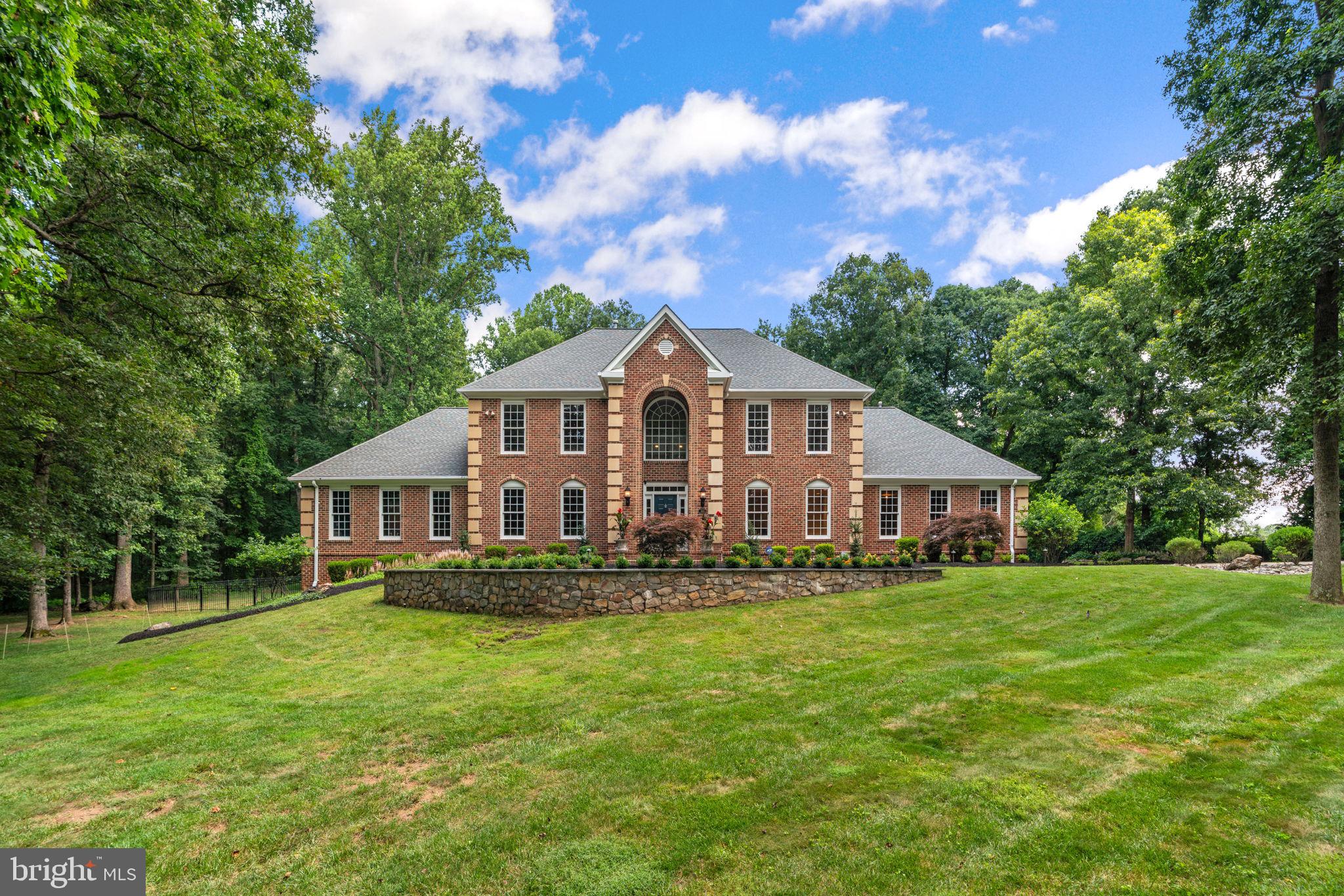 Welcome to 3143 Old Oak Drive—a meticulously updated, cared-for, and maintained, all-brick estate nestled on 3.36 flat, private acres in one of Ellicott City's most coveted communities. With 7,609 finished square feet and another 2,157 square feet of additional space ready to be customized, this home offers the perfect combination of elegance, functionality, and opportunity.

Step inside to a grand two-story foyer with a chandelier on a hoist system to find gleaming hardwood floors and timeless architectural details throughout. You'll find a formal living room that doubles as an office, an expansive dining room with two chandeliers and a butler's pantry with a wetbar that leads to the kitchen which is a showstopper—featuring a 6-burner Viking gas range, a Sub-Zero refrigerator (2024), two Bosch dishwashers, a wine fridge, double wall ovens, and a massive island surrounded by beautifully updated cabinetry that offers storage in 100 cabinets and stunning counters along with a walk-in pantry and breakfast room with a gas fireplace with a stone hearth! Beautiful updated flooring too! Don't miss the 1st floor mudroom, featuring a 2nd refrigerator, two broom closets, and a laundry area. The two-story great room features a unique domed ceiling and a two-story gas fireplace!

The main-level primary suite features French doors that open to the backyard, a cozy gas fireplace, dual walk-in closets, and a spa-like en-suite with a freestanding tub, custom tile, oversized walk-in shower and plumbing rough-in for a bidet and there's a 2nd office with french doors that lead to the private rear yard, too.

Upstairs, you'll find four huge bedrooms and three full bathrooms that have been beautifully updated, including a jack & jill bathroom between two of the bedrooms, and all with large walk-in closets. 

The finished walkout lower level features a home theater, wet bar with wine fridge and dishwasher, home gym or 6th bedroom, and even a dumbwaiter to the 3-car garage—a unique and convenient feature! The garage boasts 9-foot doors, interior access, and a cobblestone widened driveway for ample guest parking along with a basketball hoop and sport court area.

Outside is a private oasis where you'll want to spend summer evenings: lush landscaping, magnolia trees with uplighting, a small babbling stream, heated koi pond, stone patio with gas grill hookup, hot tub, and a fully fenced, gated backyard—plus room for a pool (the septic is located in the front). Extensive hardscaping in the front too!

Additional highlights include: 3 gas fireplaces, including one in the owner's suite, Extensive updates from 2013–2025,  Brick on all sides, Next to 275 acres of preservation land, Plumbed for two hot water heaters,  built-in speakers, Crown molding, custom window treatments, pocket doors, 9 foot ceilings, whole house water treatment sysystem including reverse osmosis and mineralization.

Located in the highly sought-after Marriotts Ridge HS, Mount View MS, and West Friendship ES district, this estate offers timeless luxury, thoughtful upgrades, and unmatched privacy.

Too much to list!  You need to come and see it for yourself! Roof '18! HWH' 17! HVACx2 '18! Generac '24! Sliding Glass Doors ' 23! Hot Tub '18!

The contract fell through at closing, through no fault of the sellers.  The buyer's were unable to meet their financing contingency and close.