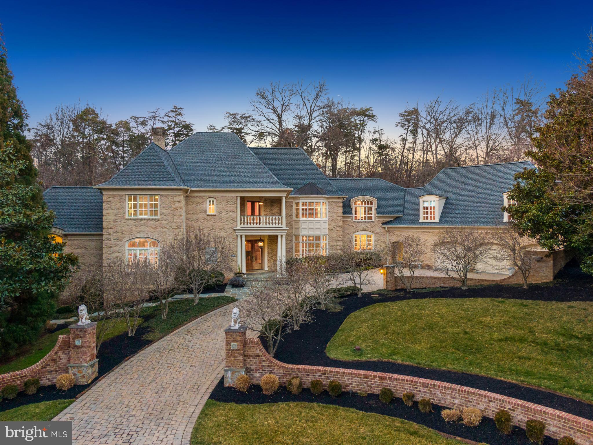 Welcome home to 2400 Oakmont Ct, a true one-of-a-kind home oasis, located in one of Oakton’s most beautiful and private neighborhoods! Uniquely sited at the end of a cul-de-sac on a private 1.75 acres with a pool, hot tub, sport court, and waterfall pond all backing to mature trees! As you enter the home, you are greeted by a grand 2-story foyer with a direct view of the living room, with floor to ceiling windows and a picturesque fireplace, all overlooking the stunning backyard. The dining room is the perfect space for entertaining, with seating for 14+ guests that leads right into the kitchen. In the kitchen you will find a gas cooktop, double ovens, two dishwashers, oversized fridge & freezer and a large island! The breakfast room has a beautiful cathedral ceiling and opens to both the backyard and great room. The 2-story great room features a fireplace, a second staircase to the upper level and access to the pool changing room/full bath. The main level is complete with a custom mahogany wood library with a barrel ceiling. The main level primary suite features a newly renovated spa bath, sitting room, and access to the side deck that has the hot tub. The upper level has 4 bedrooms, each with their own recently renovated en-suites. Two of the bedrooms share a sitting room, and a private staircase with its own private entry door, a second laundy room, and access to the garage. The lower-level hosts 2 large rec rooms, a media ready room, a gym, bedroom, full bath, bar, and the perfect space for a wine cellar! Additional features include a large mud room, main level laundry room, an oversized 3-car garage, a paver driveway, replaced roof, newer pool equipment, and so much more!