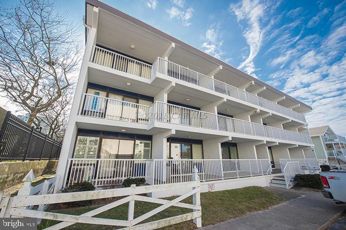 Welcome to this beautifully updated first-floor unit, Ideally located on the coveted Ocean Block- just steps to the sand. This inviting 1 Bedroom- 1 Bath retreat offers the perfect blend of comfort, style and convenience in highly desirable location, Inside you will find a thoughtfully renovated interior featuring a bright, open concept living space with warm wood flooring and seamless flow into upgraded kitchen, The kitchen shines with granite countertops, stainless steel appliances, custom cabinetry, and ample prep space, making it perfect for entertaining or everyday living.The bathroom has been tastefully remodeled with tile walk-in shower, updated vanity and modern finishes. Enjoy easy access with first floor convenience steps to the beach. Whether you're looking for a beach getaway, rental investment or a year round retreat, this property checks All the boxes prime location, stylish updates and just steps to the Ocean. Don't miss this opportunity to own your slice of Ocean  City paradise!