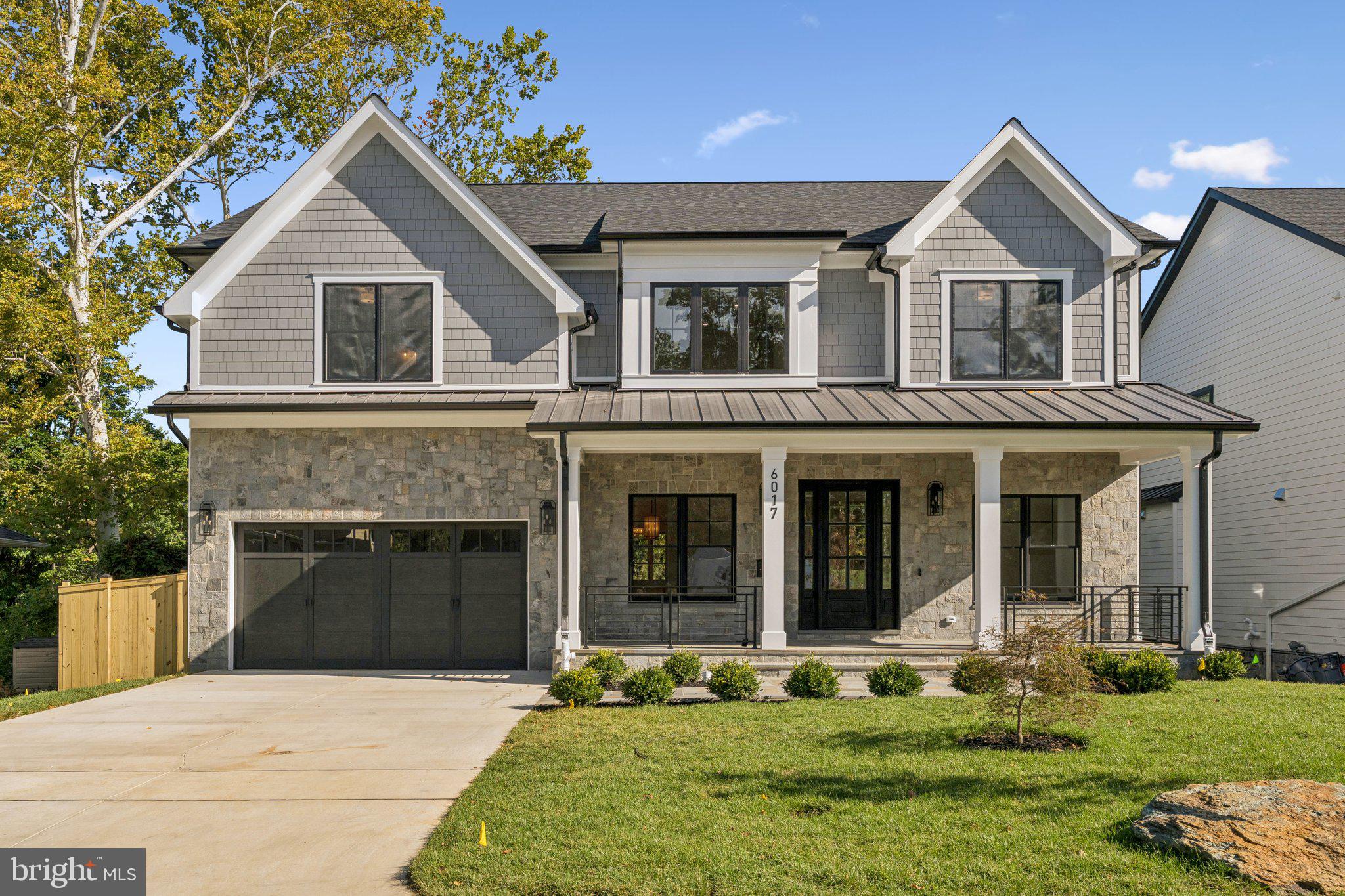 Experience modern luxury living in this stunning, newly built home by ERB Properties, located in the highly desirable Wildwood Manor neighborhood of Bethesda. This exquisite 6-bedroom, 5.5-bathroom residence showcases exceptional craftsmanship and sophisticated design. The expansive main level features an open-concept layout, effortlessly connecting the gourmet kitchen, breakfast area, main level bedroom with full bath, and family room—perfect for both everyday comfort and entertaining. Large windows and soaring ceilings flood the space with natural light, creating an inviting and airy ambiance. For more formal occasions, the separate dining area and elegant living room provide an ideal setting for gatherings. On the upper level, the tranquil primary suite is a true retreat, complete with dual walk-in closets and a spa-inspired ensuite bathroom. Three additional well-appointed bedrooms, three full baths, and a convenient laundry room round out this floor. The fully finished level walk out basement enhances this home’s appeal, featuring an additional bedroom, full bath, and a spacious recreation room, ideal for a home gym, media lounge, or play area. Outside, enjoy a relaxing deck and a fenced backyard with lush green space, offering both privacy and tranquility, along with a two-car garage for added convenience. Located just minutes from I-270, I-495, Pike & Rose, and Downtown Bethesda, this home provides unmatched accessibility to major roads, premier shopping, dining, and entertainment. You’ll also be within walking distance of Wildwood Shopping Center, Davis Library, and Georgetown Square, as well as top-rated schools. Don’t miss out on this rare opportunity to own a brand-new luxury home in one of Bethesda’s most sought-after neighborhoods.