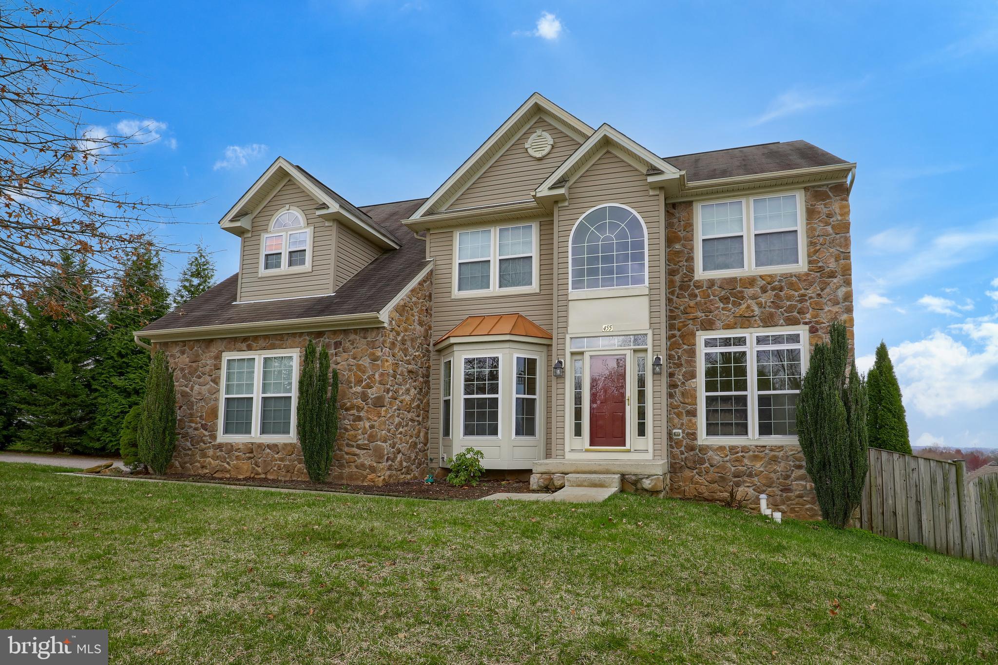 This home has so much to offer to its new owners.  You'll quickly experience the open free flowing floorpan as soon as you enter into the foyer.  The oak hardwood floors are all shined up and looking amazing!  The first floor layout is ideal for modern living and the growing family.  The oversized great room has 20ft high ceilings and tons of windows for endless amounts of sunlight spilling into the room.  The kitchen has tons of cabinetry and counter space as well as a cleaver dry bar area between the kitchen and the dining room.  The first floor office has glass paned French doors and the perfect spot for the in home office in our new world.  What's really neat is the secondary staircase just off the kitchen that leads up to the second floor.  The master ensuite is something to behold!  There is so much room and furniture options for you to work with and if you're a bath lover, wait until you see this oversized tub that has plenty of decking for candles, towels or whatever your heart desires! If you haven't been convinced yet, the finished walk out basement will surely do the trick!  Lots of natural light and open space for you in the basement.  There's even a reserved spot for a future theatre room that can easily be added!  With this home so close to Dallastown Middle and High School, you can be assured your children can get home fast and safely.  This development is not some huge development you get lost in.  It is designed perfectly for you to walk or ride bikes and not worry about traffic.  It's all here for you!