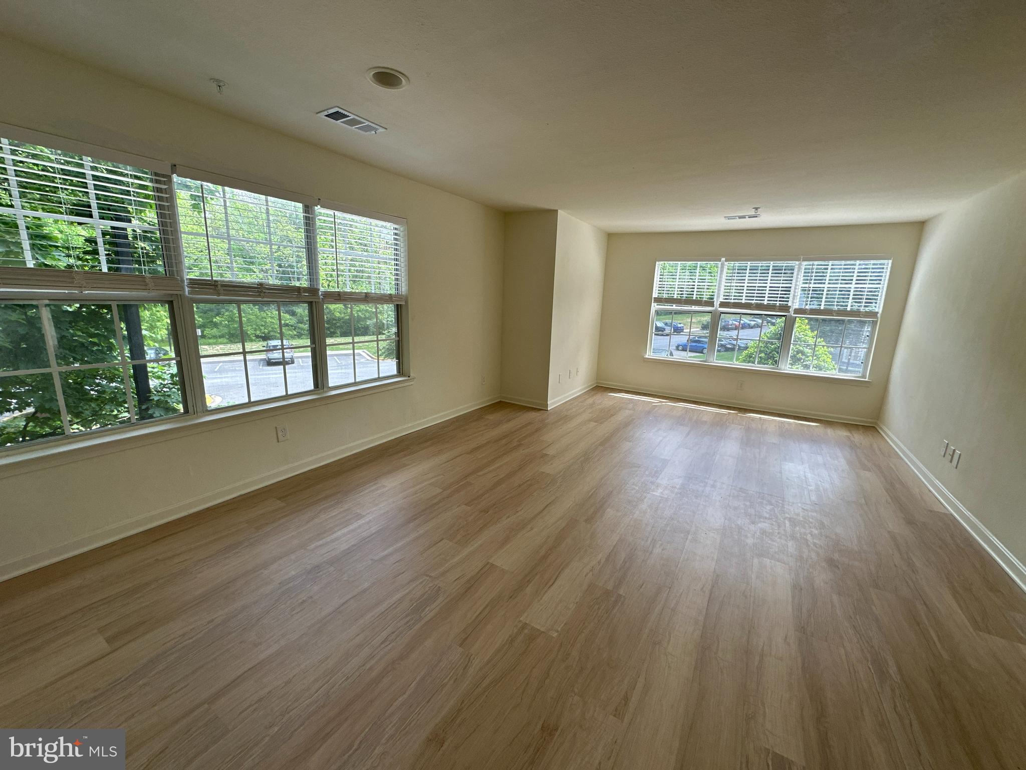 Stunning Newly Renovated 2-Bedroom Apartment in Prime Gaithersburg Location!  Welcome to your dream home at 18520 Boysenberry Drive! This beautifully renovated 2-bedroom, 2-bathroom apartment with an assigned deeded parking spot is a perfect blend of modern luxury and convenience. Step inside to discover luxury engineered flooring that flows seamlessly throughout the space, creating an inviting atmosphere.  The brand-new kitchen boasts top-of-the-line appliances and stylish finishes, making meal prep a delight. Both bathrooms have been exquisitely renovated, featuring contemporary vanities, tiles and fixtures for a spa-like experience. Enjoy the added benefit of a designated parking spot and plenty of visitor parking for your convenience.  Located on the second floor, this unit offers a serene view of the surrounding trees, providing a peaceful retreat. Residents of this vibrant community enjoy an array of amenities, including a sparkling pool, tennis courts, a picnic area, and a play area, perfect for relaxation and recreation.  With easy walkability to the Gaithersburg Library, local shops, and restaurants, plus quick access to the bus station and highway, this location truly has it all. Don’t miss your chance to live in this exceptional apartment—schedule a showing today and experience modern living at its finest! To qualify: Household income of $66k+, minimum credit score of 600+, no pets, no smokers. Application fee is non-refundable under any circumstances. Contact the agent for the application.