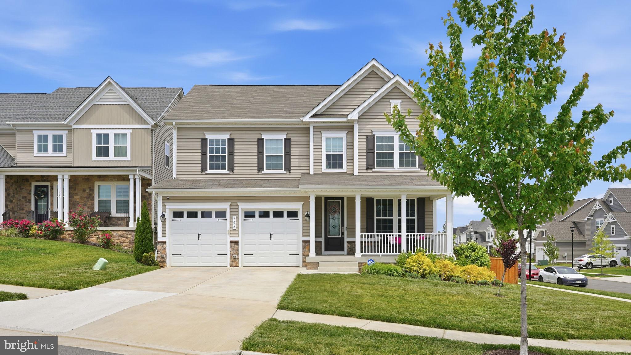 Welcome home to this beautiful property located on a quiet corner lot in the sought-after Embrey Mill neighborhood. Located on one of the larger lots in the community, this beautifully maintained home offers charming curb appeal with landscaped grounds and a welcoming front porch perfect for relaxing outdoors. Inside, beautiful vinyl flooring creates a clean and cohesive feel throughout the main level. Just off the entryway is a private office with double doors, ideal for working from home or creating a dedicated homework space. The spacious living room is centered around a stylish electric fireplace that adds warmth and character. The kitchen is designed for everyday living and entertaining with a large island with seating space, quartz countertops, stainless steel appliances, double ovens, recessed lighting, and plenty of cabinet storage. The extended dining area offers abundant natural light, added room for comfortable gatherings, and sliding glass doors leading to the Trex deck overlooking the backyard. The walk-in pantry features custom wooden shelving for added style and organization. Upstairs features a versatile loft space perfect for a second living area, playroom, or media room. The oversized primary suite features tray ceilings, a private bathroom with double sinks, a large walk-in closet, and a glass-enclosed shower. All secondary bedrooms are generously sized with ample closet space. The upstairs laundry room adds everyday convenience. The fully finished lower level includes a spacious rec room, full bathroom, bedroom, flex space, cozy carpeting, and additional storage. With access from both the basement and kitchen, the large backyard is enclosed by a 6-foot privacy fence and features a benched paver patio beneath the Trex deck, offering plenty of room to relax and enjoy the outdoors. Schedule your showing today! Experience the vibrant 800-acre master-planned Embrey Mill community, offering a clubhouse, two resort-style pools, more than 10 miles of walking trails, playgrounds, dog parks, a community garden, and a neighborhood bistro. The community is also home to Embrey Mill Park, featuring 11 multi-use turf and grass fields and located adjacent to the Jeff Rouse Swim and Sport Center. Ideally situated for commuters with easy access to I-95, Route 1, Quantico, and the Virginia Railway Express. Welcome home to Embrey Mill.