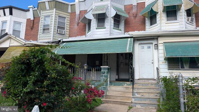 Two story, 3 bedroom. porch front row home in West Philadelphia located just off of 55th and Lansdowne Ave. Nice sized living room, separate dining room and kitchen no the first floor. Three bedroom plus full bath on the 2nd floor. Full basement plus front and rear yards. Don't miss out on taking advantage of this tremendous West Philadelphia opportunity.