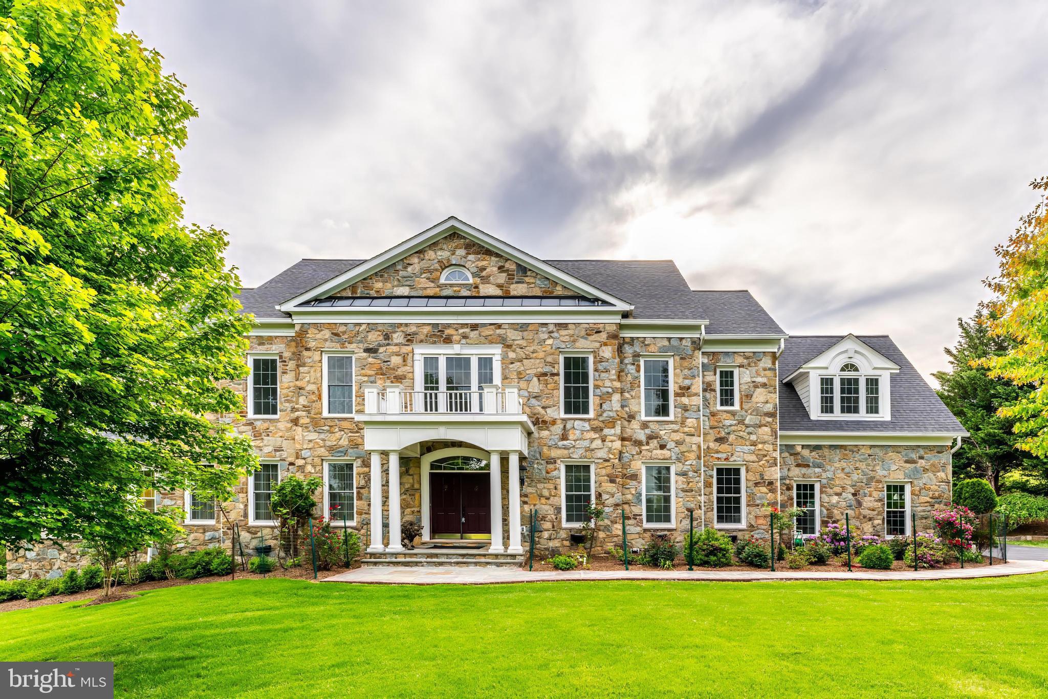 Massive Price Reduction! This is your chance to create the home of your dreams - bring your vision and make it your own with updates that suit your style. Welcome to 17181 Bold Venture Blvd, a stunning custom estate located in Beacon Hill.   This home offers luxury, privacy and convenience.  Nestled on 3 acres of picturesque land, this exquisite 6 bedrooms, 6.5 bathrooms residence boasts over 9400 square feet of designed living space, wood flooring,  a three car garage and an outdoor retreat.    Expert landscaping, stately entrance, soaring ceilings, elegant moldings and expansive windows are only a few things that make this home so appealing.      The gourmet kitchen is equipped with a Viking stove, top of the line appliances, custom cabinetry and ambience that is sure to please.   The primary suite is a private retreat with a spa-like bath, walk-in closets and serene views.  Additional highlights include,  main level home office,  media room,  wet bar,  gym, all designed for ultimate comfort and convenience.   Step outside to your own private oasis.   The stone patio and gazebo create  a  beautiful and functional outdoor space.   Do you love gardening?  The current owner has a green thumb.   Utilized the tiered garden to plant your summer tomatoes, cucumbers, eggplants while enjoying the fruits of apple and fig trees.   Don't miss this opportunity to be part of this luxurious home community offering equestrian trails and breathtaking open space that offers beautiful views and enjoy the grand opening of the redesigned 18-hole golf course, due to open in 2025.  Easy access to Dulles Airport, downtown Leesburg, wineries and much more.  Open house Sunday June 29th, 12-1:30pm