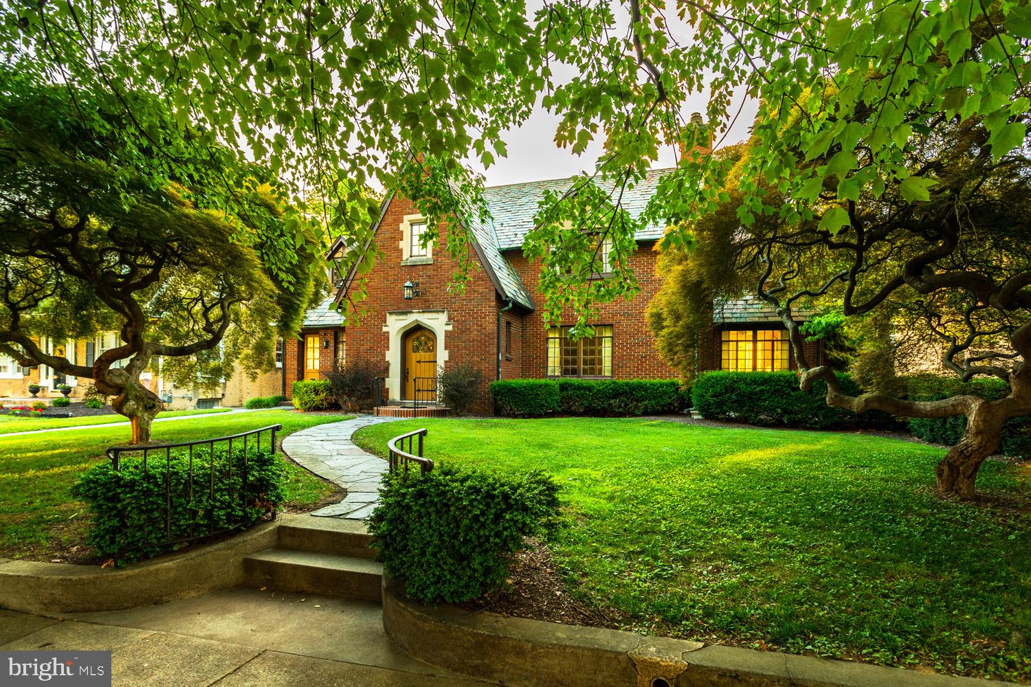 Nestled on one of the most desirable blocks of Chestnut Street, this charming 1930 Tudor Revival home is filled with the character and craftsmanship that today's buyers rarely find. From the grand staircase, arched doorways, original wood floors, and crystal-style glass doorknobs to the stunning stone wood-burning fireplace, every room tells a story.

A perfect blend of historic charm with modern convenience. Over 3,000 square feet, efficient natural gas heat, updated kitchen featuring quartz countertops, tile backsplash, and stainless steel appliances. A spacious first-floor bonus room with a separate entrance offers endless possibilities as a home office, playroom, studio, hobby room, or guest space.

Natural light pours throughout the home, while abundant closets, built-in storage, attic knee-wall storage, and a partially finished lower level with workshop provide room for everything. Outside, enjoy a private paver patio tucked alongside the home, a detached two-car garage, additional off-street parking, and a sparkling in-ground pool ready for summer gatherings.

Topped with a beautiful slate roof and surrounded by other distinguished historic homes, this is a rare opportunity to own a home rich in character, charm, and timeless appeal. Ideally situated just blocks from Columbia's thriving downtown, offering convenient access to restaurants, craft breweries, local shops, and the Northwest River Trail.
