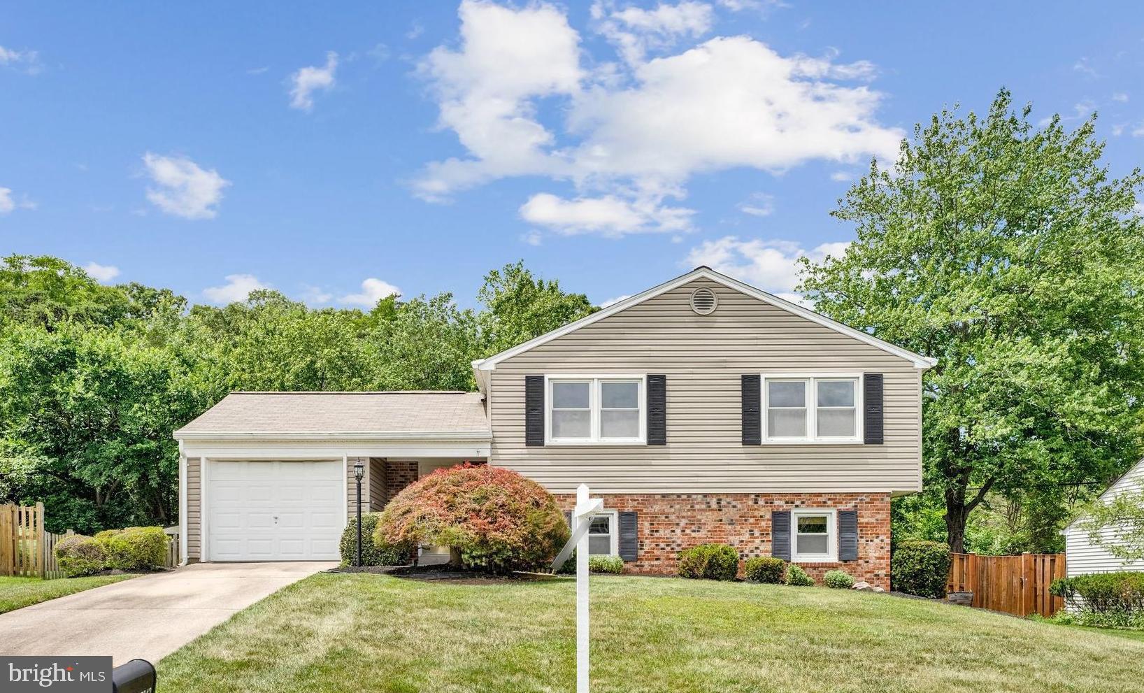 A wonderful opportunity to purchase a spacious single-family home in the lovely community of Kingston Chase. Long-term owners have loved this home for many years. The roof, windows, gutters, siding, and HVAC have all been replaced with quality replacements. Wonderful .21-acre lot with lush landscaping and fully fenced rear yard. Screened porch. 5 bedrooms and 3 full bathrooms. Wood-burning fireplace.  Ready for the new owner to come in and refresh the interior. Priced below market value.

The main level features a warm and welcoming foyer, access to the one-car garage, and access to the screened-in porch, the room where so many happy memories have been made over the years. The upper level has a Dining Room/Living Room combination, kitchen, 2 secondary bedrooms, a full hall bathroom, and a primary bedroom with its own en suite full bathroom.  

 The lower level has two additional bedrooms, one with built-in shelving that makes a great office, a third full bathroom, a large Family Room with a wood-burning fireplace walking out to the lovely rear yard, a gardener's delight, and a utility room. Very nice shed in the rear yard conveys.

The neighborhood offers family-friendly amenities such as a community pool and a kid-friendly Fourth of July parade, fostering a welcoming environment and creating a sense of belonging. The owners have loved living and raising their family here.

Just six driving minutes from the Innovation Metro Station's North Kiss & Ride, providing easy access for commuters and enhancing your daily convenience.

2020 Carrier HVAC Infinity 18 SEER
2017 Roof (one-time transferable warranty may apply)
2015 Thompson Creek Windows
2012 New Home Siding and Gutters
2014 Back Fence (long Fence)



This home is priced below market value to reflect the need for some interior updating, offering an excellent opportunity for customization and investment. The interior is ready for your personal touch, making it truly yours.

Open House Sunday, July 5th, 2- 4 PM.