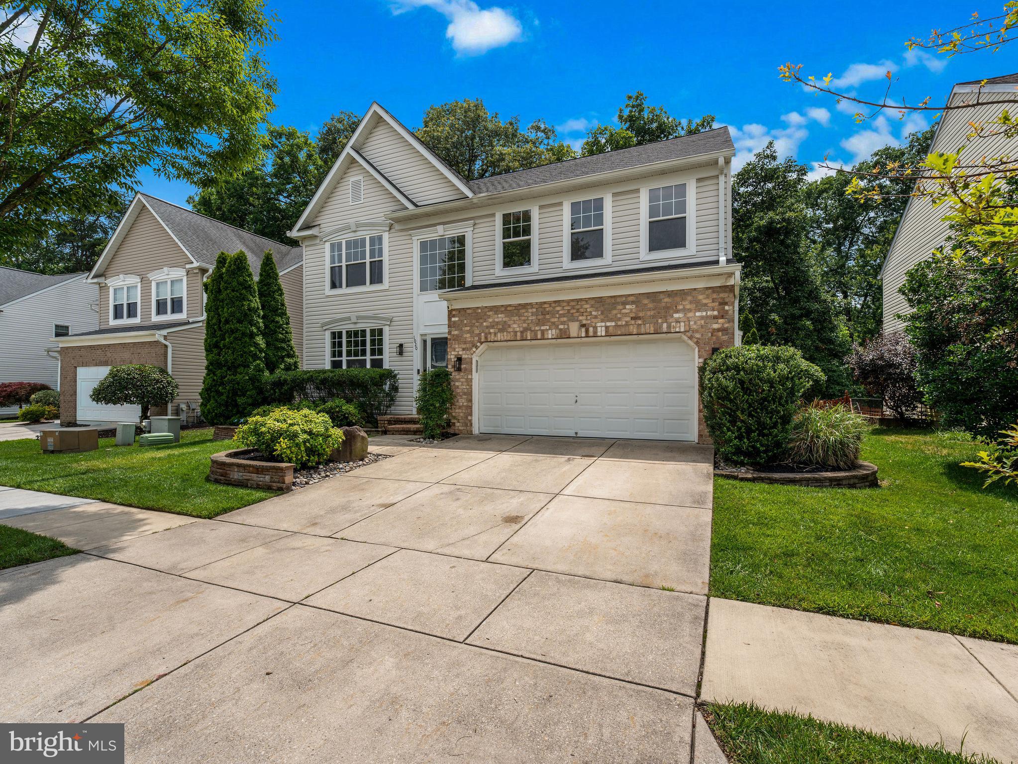 Welcome to 1020 Wheatfield Dr in Millersville! Centrally located in the desirable Daniels Purchase community, this spacious 4 bedroom, 4.5 bathroom home is one of the largest in the neighborhood and offers a setting that truly sets it apart. Unlike many homes nearby that back directly to other houses, this property backs to the woods, giving you added privacy and more usable space to enjoy out back! Inside, the home opens with a two-story entry foyer and 9’ ceilings throughout the main level. New LVP flooring flows from room to room for a clean, cohesive look. The kitchen features abundant cabinet space, an island with seating, room for a table, and access to a separate formal dining area. Soaring ceilings and a wall of windows make the adjacent family room bright and inviting; and a private office, powder room, and laundry area complete the main level. Upstairs, the generous primary suite offers a large walk-in closet and private ensuite with a double vanity, soaking tub, and separate shower. Two additional bedrooms share a Jack-and-Jill bathroom, while the fourth bedroom is situated near another full bath at the end of the hall, offering comfort and convenience for everyone. The finished basement is ready for the next owner to enjoy and entertain! With a large rec area, full bathroom, pool table, foosball table, and Golden Tee arcade machine, this level is perfect for parties, movie nights, game days, or just extra everyday living space. Another large finished room in the basement is great for storage or a potential 5th bedroom. The backyard steals the show. Backing to the woods, the setting feels serene and private, with plenty of room to play, relax, or entertain on the expansive paver patio. An in-ground irrigation system allows for effortless watering in the hot summer months. Recent updates include a new HVAC system in 2025, new roof (50 yr transferrable warranty) and gutters in 2021, and recently replaced exterior doors and trim. Daniels Purchase offers great community amenities, including a swimming pool, playground, tennis courts, basketball courts, and pickleball courts. The location is also convenient to shopping, dining, parks, Fort Meade, and major commuter routes such as I-97, I-695 and Rt 100. And best of all - the home is zoned for the brand new Severn Run High School!!