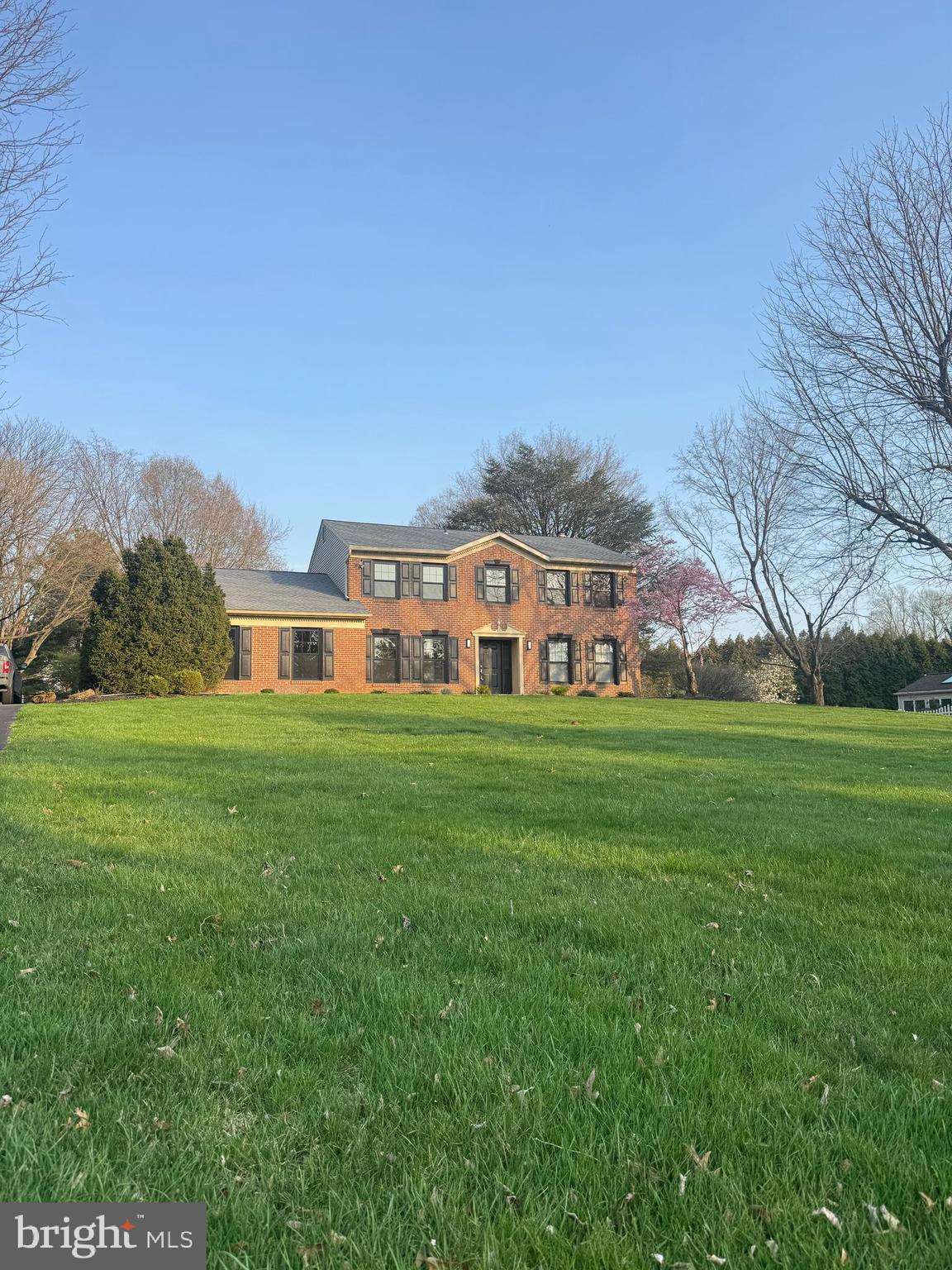 Back on the market — here’s your second chance to own this beautifully renovated home! The previous buyer was unfortunately unable to secure mortgage approval, giving a new buyer the opportunity to make this exceptional property their own.

Welcome to 657 N Wales Rd in North Wales — a stunning brick home situated on nearly one acre, where modern luxury meets everyday comfort. This fully renovated 4-bedroom, 2.5-bath residence offers a bright and inviting layout with high-end updates throughout.

Walk up from the driveway along the brand-new concrete front walkway and step inside to discover a thoughtfully designed interior. To the right of the entry is a spacious room perfect for a home office, sitting area, or entertainment room. To the left is a warm and welcoming family room, ideal for everyday living and gatherings.

Continue down the hallway into the expansive living room featuring a sleek modern fireplace and oversized picture windows overlooking the backyard. A door leads directly to the large brick patio, creating the perfect indoor-outdoor flow for entertaining.

At the center of the home is a breathtaking brand-new kitchen designed with both elegance and functionality in mind. The kitchen features sleek cabinetry, updated appliances, contemporary finishes, and a stunning waterfall-edge white quartz island that brings a luxurious touch to the space. Adjacent to the kitchen is a spacious breakfast and dining area filled with natural light from skylights above. Sliding glass doors open to the oversized brick patio and expansive backyard, making it ideal for parties, gatherings, or peaceful outdoor living.

Brand-new thick engineered white oak hardwood flooring flows throughout the home, adding warmth, durability, and a clean modern aesthetic.

The home includes two fully updated bathrooms with stylish modern finishes — one conveniently located in the hallway and another in the spacious primary suite. A beautifully updated half bath is located on the main floor for guests. Every bedroom features updated closet space, while the primary bedroom offers a generous walk-in closet.

Entering from the attached two-car garage, you’ll find a bright and modern mudroom that creates a clean and functional transition into the kitchen and dining area.

Natural light pours through newly installed windows throughout the home, enhancing both comfort and energy efficiency. A brand-new shingle roof provides additional long-term value and peace of mind.

All four bedrooms are generously sized, offering comfort and flexibility for family and guests alike. Outside, the spacious yard offers endless opportunities for entertaining, recreation, gardening, or simply enjoying the peaceful setting.

Head downstairs along the brand-new staircase to a fully finished basement featuring durable luxury vinyl plank flooring and abundant recessed lighting throughout. This versatile lower level is ideal for a home theater, office, gym, playroom, or additional living and entertainment space.

Nearly every detail in this home has been updated and thoughtfully improved — even a dedicated 220V line has already been installed for a future EV charger. Simply pack your belongings and move right in — no additional work or expenses needed.