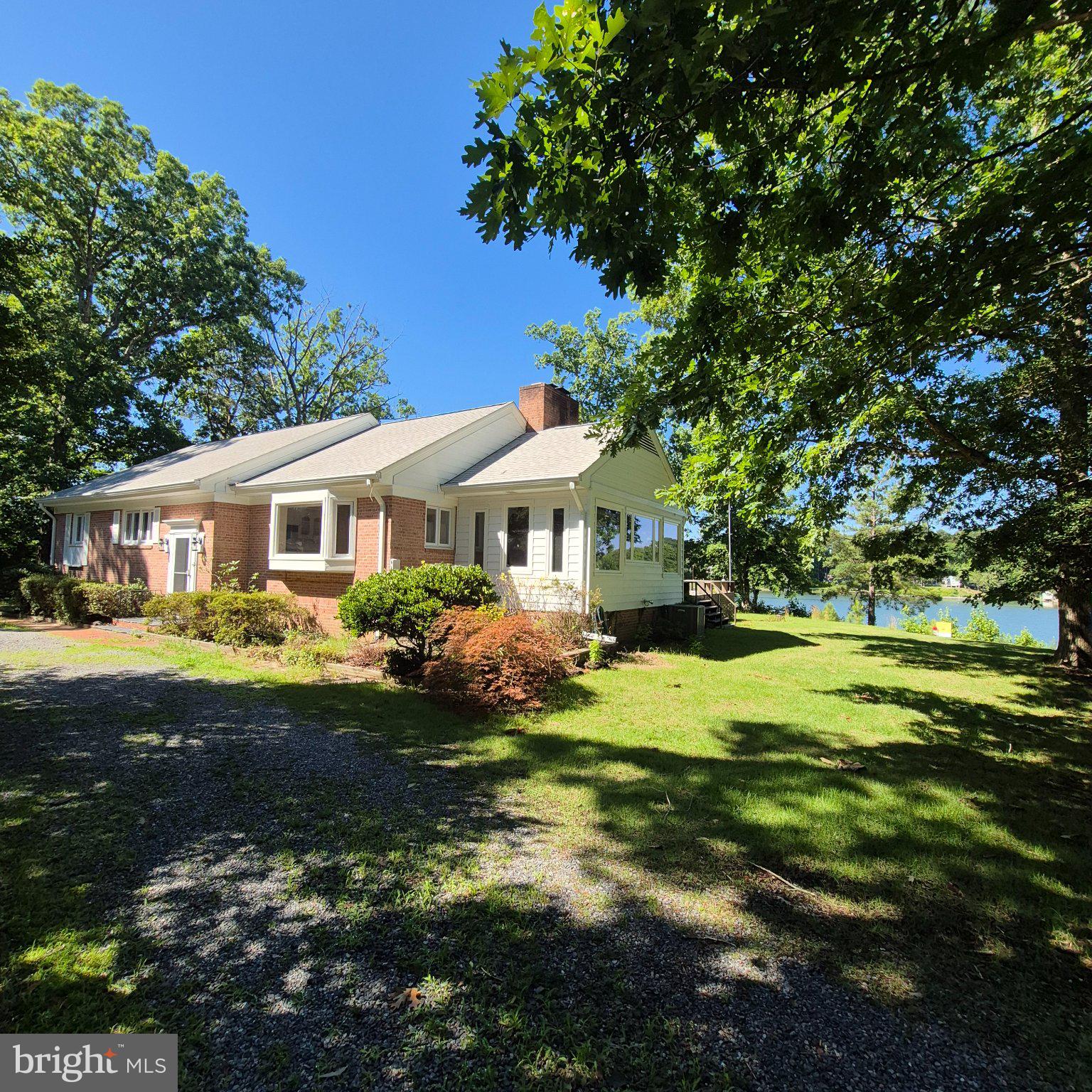 Sailboats are welcome on this deep water protected cove on Barretts Creek of the Great Wicomico River.  This charming split level 3 bedroom rancher on a wooded 2 acre lot with sand bottom, riprap shoreline protection, pier, generator, shed and garage was recently appraised at 695K and has been reduced to 650K with hopes of an AS IS contract.  Great views from the Florida Room, Living Room and master bedroom will brighten your day.  The community well is $325/ year and HOA dues are $75/ year.  Shown by appointment only with listing agent present.  Recent Hom Inspection and appraisal are available upon request.