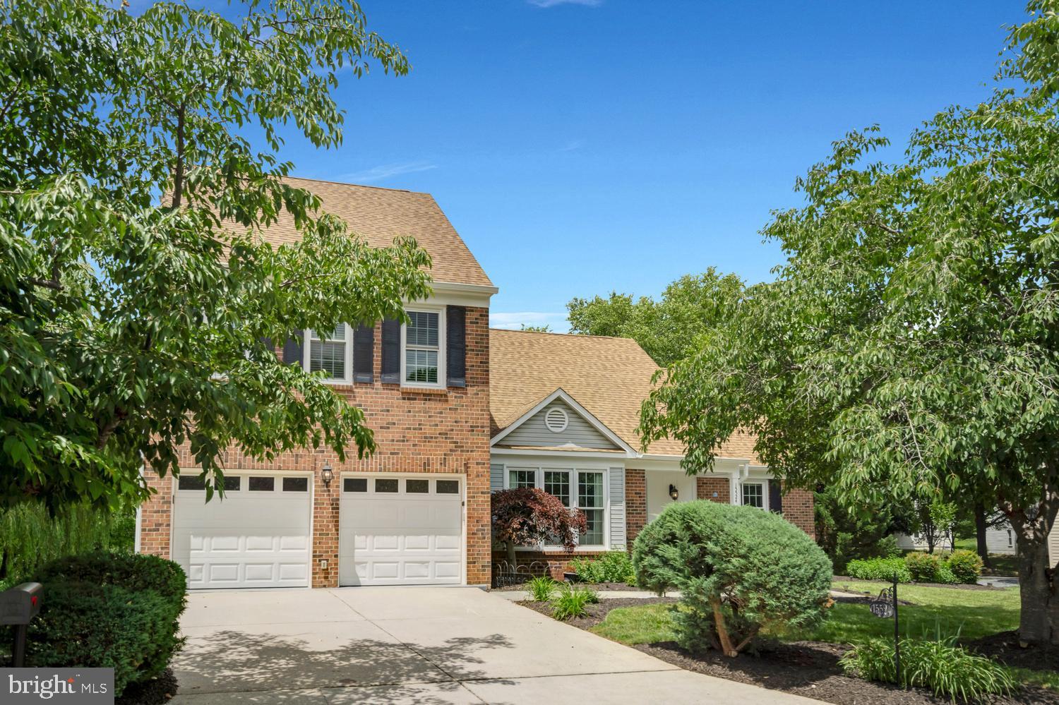***OPEN HOUSE - SUNDAY - 6/21 - 1-4PM***  AMAZING Colonial with Main Level Primary Bedroom/Bathroom! * Elegant flagstone front porch and walkway with impressive curb appeal and a spacious 2-car garage. * Grand two-story foyer with soaring vaulted ceilings and gleaming cherry hardwood floors throughout the main and upper levels. * Desirable main-level primary suite featuring a private office, generous closet space, and a luxurious marble en-suite bath with dual vanities, soaking tub, and oversized shower. * Gourmet Kitchen with quartz countertops, white cabinetry, premium KitchenAid and LG appliances, and a dedicated wine refrigerator * Spacious family room with a raised-hearth flagstone fireplace and seamless flow to the dining area. * Upper-level second primary suite with two walk-in closets and a beautifully updated luxury bath * Finished lower level featuring a large Gathering room with fireplace, third primary bedroom suite, full bath, large Recreation room, and abundant storage * High-end laundry room with quartz countertops and dual front-loading LG washers and dryers * Stunning three-level rear deck overlooking the backyard and direct access to Rock Creek Park *

This is a rare opportunity to own a truly special property that blends timeless elegance with modern luxury, this exceptional home offers an unbeatable combination of spacious living, thoughtful updates, and a breathtaking natural setting. Step outside your front door and discover a vibrant neighborhood that has community spirit. Just a short drive to Flower Valley Bath and Racquet Club (memberships available), where you can enjoy tennis, pickleball, swimming, and social events. Flower Valley Park adds to the appeal with basketball courts, playgrounds, and scenic walking trails around Lake Frank. With convenient access to the ICC and Metro’s Red Line, commuting to Baltimore or DC is quick and stress-free.