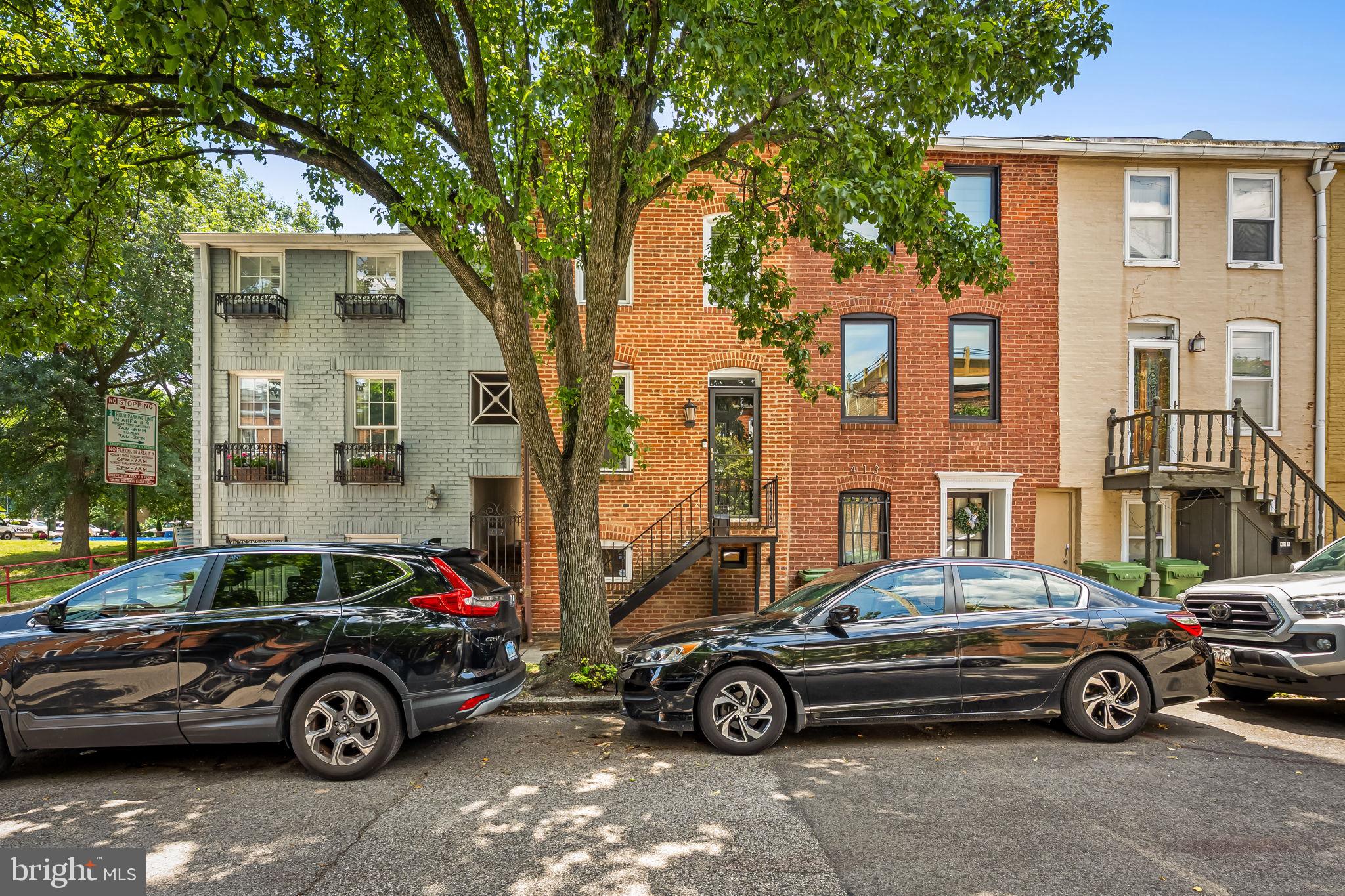 Welcome to 415 E Cross Street, a charming 2-bedroom, 1.5-bath home ideally located in the heart of Federal Hill. Just four blocks from Cross Street Market and only two blocks from the waterfront, you'll enjoy easy access to some of Baltimore's best restaurants, nightlife, museums, and entertainment. Federal Hill Park, local schools, and numerous neighborhood amenities are all within walking distance, making this vibrant, dog-friendly community one of the city's most desirable places to call home.

Step inside to an inviting, light-filled living space featuring rich hardwood floors that flow throughout all three levels. The open layout offers the perfect blend of character and functionality. Upstairs, you'll find a spacious loft-style primary bedroom complete with a walk-in closet and generously sized full bath. The lower level features a versatile second bedroom with new flooring and a convenient half bath, ideal for guests, a home office, or additional living space.

Outdoor entertaining is a breeze with both a private fenced backyard and a rooftop deck, providing multiple options to relax and enjoy city living. Whether you're a first-time homebuyer, a busy professional seeking easy access to downtown, or someone looking to downsize without sacrificing style and location, this Federal Hill gem is not to be missed.