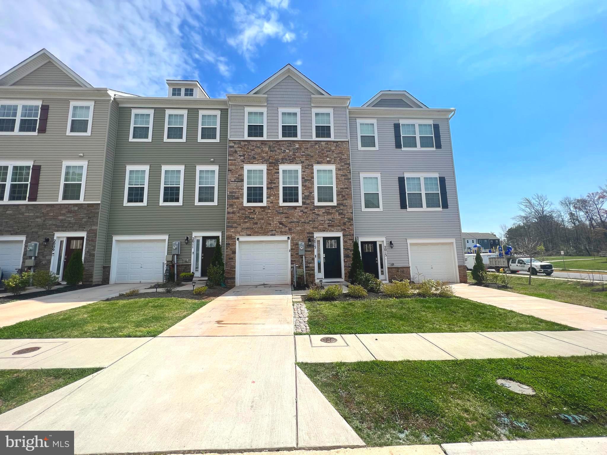 Beautiful 3 level garage town home in Odenton. Open concept floor plan with luxury wood flooring on  main level and foyer. Gorgeous kitchen with stylish espresso cabinets, granite counters, large island with room for seating, stainless steel appliances and dining area. Large living room with slider to deck on main level. Upper level features primary bedroom with walk in closet and ensuite bath featuring double sinks and large walk in shower.  2 additional bedroom and full hall bathroom complete the upper level.  Laundry on bedroom level. Lower level family room with slider to rear fenced in yard and 1 car garage.  Conveniently located to DC, Baltimore, Ft. Meade, Annapolis, shopping, restaurants, schools and all major commuter routes.  Tenant occupied.  Home will be professionally cleaned.