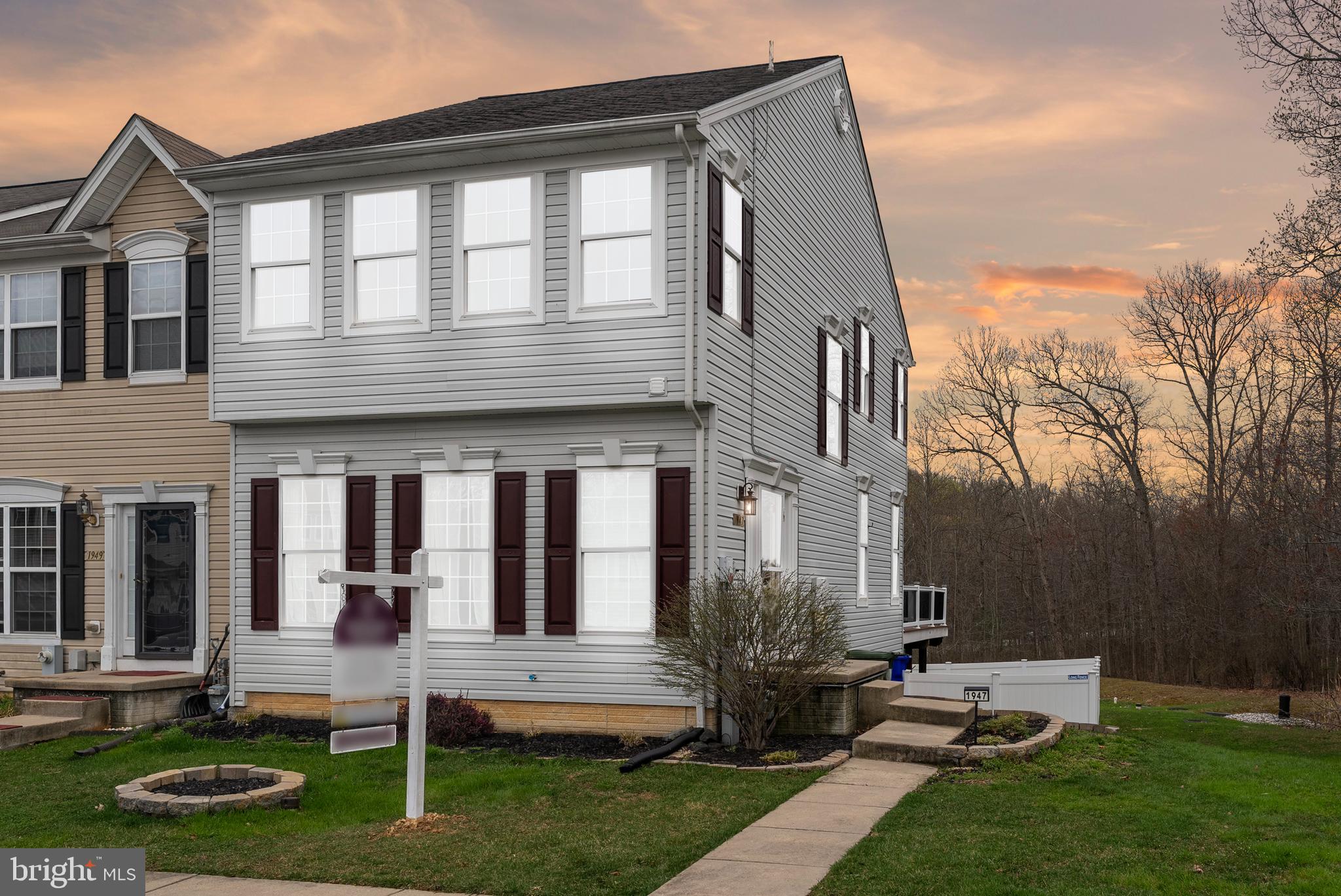 Welcome Home to 1947 Waltman Rd! 🏡✨

Looking for a modern, spacious, and stylish townhouse to call your own? Look no further! This beautifully maintained end-of-group, 3-story townhome is everything you've been dreaming of and more. Step into the bright and inviting foyer, where hardwood floors and soaring ceilings create a warm and welcoming atmosphere. The versatile front great room can be used as a formal living area or a living and dining room combination, offering flexibility to suit your lifestyle. A thoughtfully designed switchback stairwell—tucked away with a charming side window—fills the space with natural light. At the heart of the home is a gourmet-style kitchen, featuring a large island, sleek 42" cabinets, and stainless steel appliances—a dream for cooking and entertaining! A flex space adjacent to the kitchen serves as a breakfast nook, cozy sitting area, or extended dining space, giving you options for how you want to live. At the rear, a sun-filled bonus room awaits—perfect for a home office, intimate family room, or creative space. Upstairs, escape to the luxurious primary suite, complete with a spa-like ensuite bath featuring a walk-in shower, corner soaking tub, and double vanity—your own private retreat! Two additional spacious bedrooms share a well-appointed hall bath with a convenient linen closet.The lower level provides even more living space, including a third full bath, a bonus 4th room, and an expansive family or recreation room—ideal for guests, a home gym, or media lounge. A walkout rear entrance leads to a serene, wooded backdrop, creating the perfect spot for relaxation or outdoor gatherings.To top it all off, this home features a brand-new roof, new windows, fresh carpet, and luxury vinyl flooring in the bathrooms. Plus, with an energy-efficient Tesla solar system, you'll enjoy savings on rising energy costs while living sustainably!Conveniently located near shopping, the MARC Train, and major highways, this home seamlessly blends style, comfort, and accessibility. 

Don’t miss this opportunity to own a move-in-ready home in a prime location! Schedule your showing today!