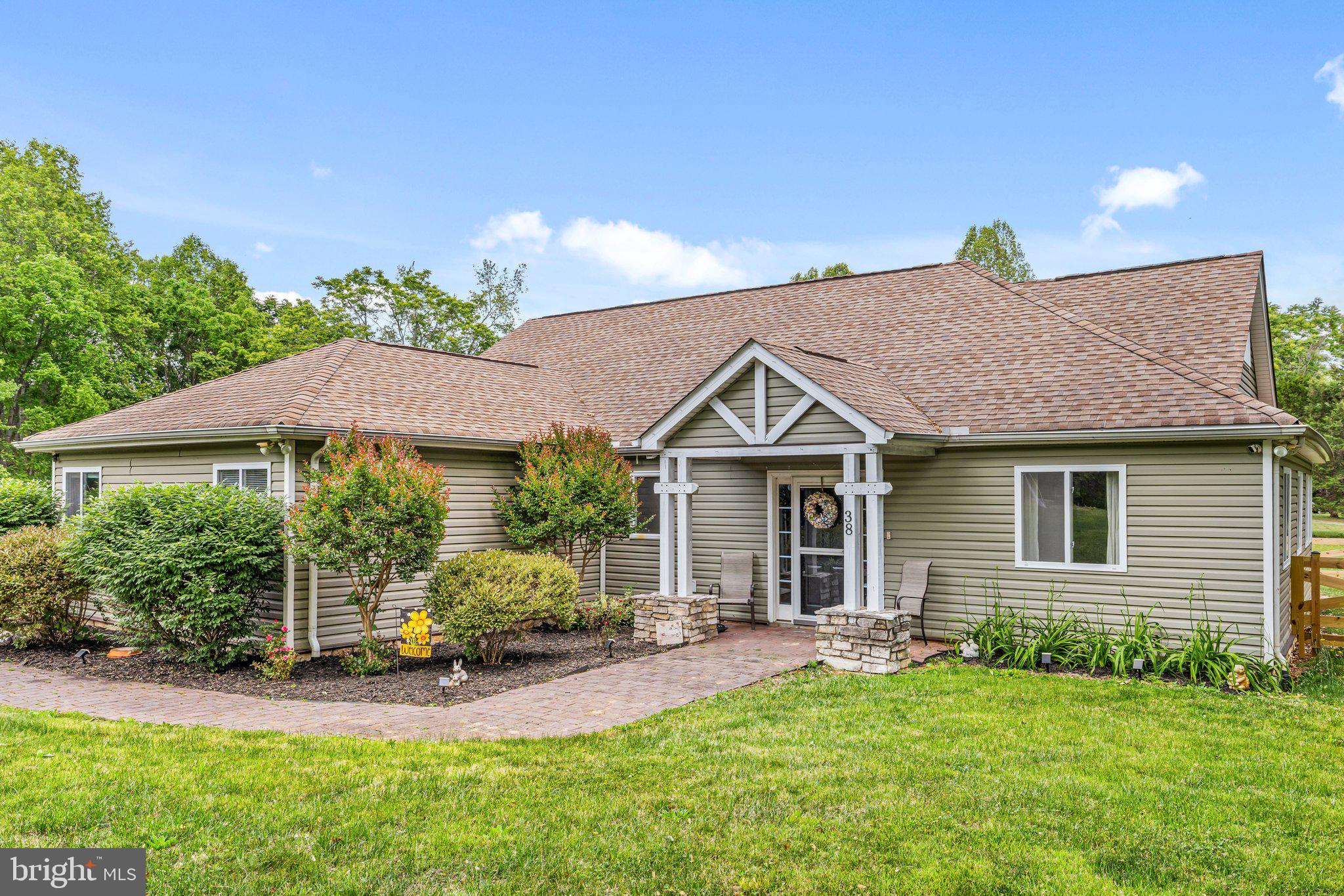 Tucked away on nearly an acre in a private lake-access community, this beautifully updated 5-bedroom, 2-bath home blends modern style with cozy charm. From the moment you walk in, you’ll love the bright open layout, thoughtfully updated finishes, and inviting spaces designed for both everyday living and weekend escapes. The stylish kitchen and living areas flow effortlessly, featuring a stunning oversized walk-in pantry and beautiful sliding barn doors throughout the home that add warmth and character. 

The charming loft creates the perfect book nook, reading retreat, or flex space, while the spacious primary bath features a gorgeous walk-in shower. The fenced yard offers privacy and room to relax or entertain. Enjoy lake life with your deeded dock conveying with the property — making boating, fishing, and sunset evenings on the water part of your everyday lifestyle. Short-term rentals are also permitted, making this lake retreat not only a perfect personal getaway, but also a fantastic investment opportunity with income-producing potential. Whether you’re looking for a peaceful full-time home or the perfect weekend getaway, this one just feels like home.