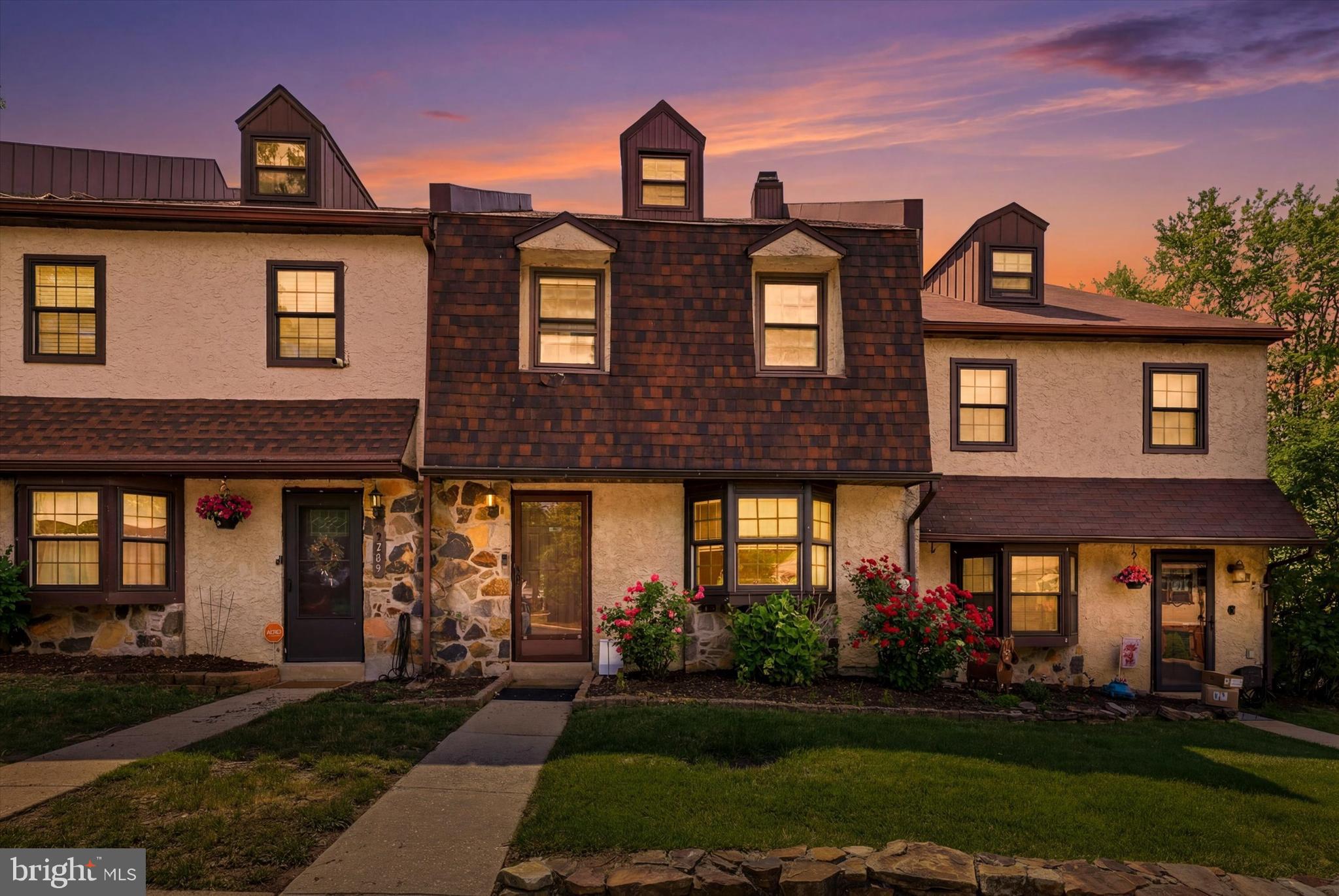 Proudly presenting 208 Smallwood Court, one of the largest models in the Exton Station community, offering an exceptional combination of space, comfort, and convenience. With 4 bedrooms, 3 full bathrooms, and a powder room conveniently located on the first floor, this thoughtfully designed home provides the flexibility that today's buyers are looking for. Enjoy scenic views from either of your two (2) private decks overlooking beautifully maintained green space and mature trees, creating a serene outdoor retreat rarely found in community living. Inside, a comprehensive interior renovation completed in 2017 transformed the home with modern finishes, a wood-burning fireplace, and engineered hardwood flooring throughout the main living areas. The bedrooms feature comfortable carpeting that was professionally shampooed in June 2026, and an extensive list of owner improvements adds even more value and peace of mind. Heat pump (2018), hot water heater (2017), interior painting (2023 & 2026), dishwasher (2025), microwave (2025), laundry machines (2024), and basement utility sink (2020). Whether you're downsizing from a larger home, purchasing your first property, or simply seeking a lifestyle with fewer maintenance responsibilities, this home checks all the boxes. The community association handles all landscaping duties, allowing you to spend more time enjoying your home as well as the amenities, including a community pool, tennis courts, playgrounds, and expansive, meticulously maintained common grounds. RUN... don't walk, because 208 Smallwood Court presents an outstanding opportunity for buyers in every stage of life.