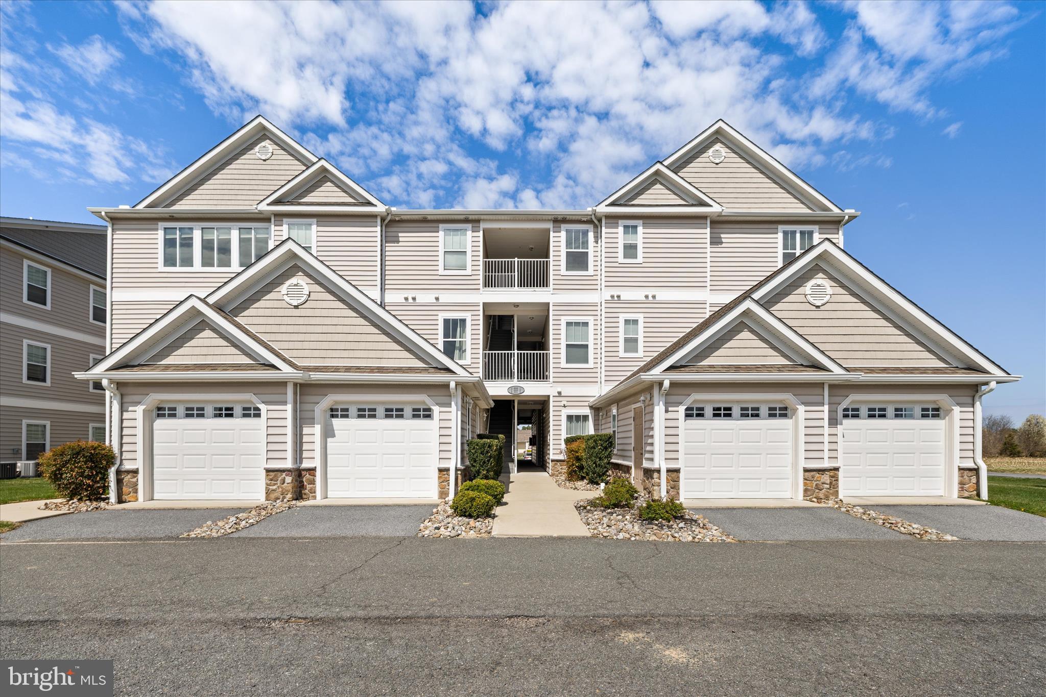 Discover the perfect blend of comfort and convenience in this stunning 2-bedroom, 2-bathroom apartment nestled in the desirable Hearthstone Manor community. Built in 2017, this contemporary gem offers a modern lifestyle with all the amenities you desire. Step inside to find a spacious layout designed for both relaxation and entertaining. The open-concept living area flows seamlessly into a well-appointed kitchen, making it ideal for hosting friends or enjoying quiet evenings at home. With convenient washer and dryer, laundry day becomes a breeze. Enjoy the luxury of community living with access to a sparkling outdoor pool and a welcoming clubhouse, perfect for gatherings and leisure activities. The meticulously maintained grounds, covered by the association fee, ensure that you can spend your time enjoying life rather than worrying about upkeep. Your new home also features an attached garage with front entry, providing both convenience and security. Imagine sipping your morning coffee on your private patio, surrounded by the beauty of well-kept landscaping. Located in a vibrant community, close to Bayhealth Hospital, you'll find shopping, dining, and recreational opportunities just moments away. You can be on the beach in 30 minutes. This is more than just a home; it's a lifestyle waiting for you to embrace. Don't miss your chance to make this beautiful apartment your own-schedule a showing today and step into your future!