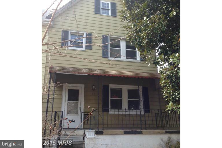 Spacious EOG townhome with large fenced in yard in need of TLC. Good investment opportunity with rents improving in area. Buyer to verify all information pertaining to property. GR TBD. Vacant - show anytime. AS-IS.
