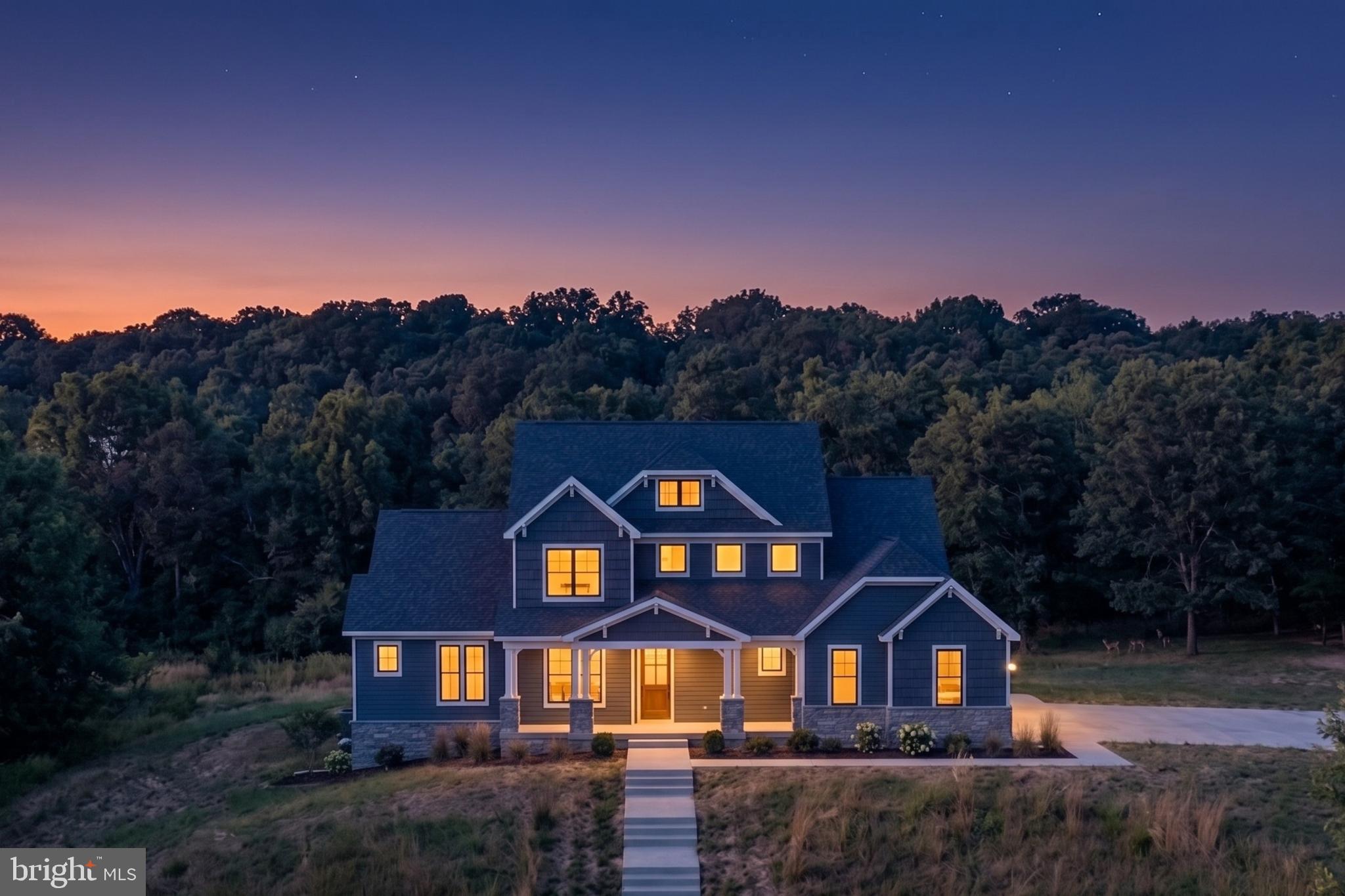 Experience luxury new construction by Laine Street Homes on over an acre with scenic wooded surroundings and no restrictive HOA. This thoughtfully designed to-be-built home, currently under construction, features a stunning two-story foyer, spacious family room with gas fireplace, gourmet kitchen with oversized island and upgraded ZLINE stainless steel appliances, morning room, private study, and luxurious main-level primary suite. A covered front porch and rear deck overlook trees and open space.

Upstairs offers three additional bedrooms and two full baths, while the finished walkout basement includes another bedroom and full bath.

Luxury finishes and quality craftsmanship throughout include 7" luxury plank vinyl flooring, Craftsman-style railings and doors, modern trim details, custom light fixtures, 2x6 exterior walls, engineered LVL and steel beam support, and HardiePlank siding with stone water table surround. Additional features include high-efficiency dual-zone HVAC,  EV charging pre-wire, and spacious 3-car garage. Built with energy efficiency in mind with R-49 attic insulation, foam and caulk air sealing package, ThermaTru insulated doors, and Pella Low-E windows.

List price includes the options and finishes shown in the plans and is not a base price. Photos are renderings and examples of this model and similar homes by Laine Street Homes and are shown for reference only. Construction has begun and is expected to be completed in the Fall of 2026. Call listing agent for details.

Just minutes from Downtown Frederick, with easy access to Rt. 15, I-70, and I-270, approximately 50 miles to both Washington D.C. and Baltimore, and close proximity to shopping, dining, parks, and hiking trails.