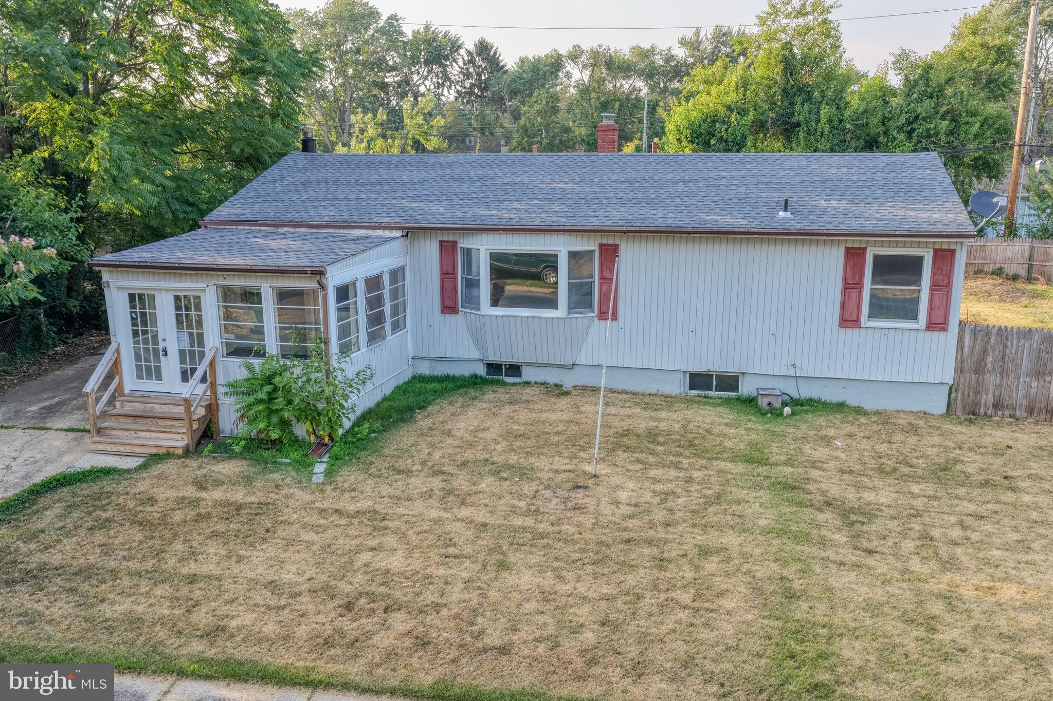 This home features 3 beds, 1 bath, a full basement, fully fenced in backyard and an enclosed porch. Recent updates include: a new roof as of 2025,  new hvac as of 2026, fresh paint, new floors, updated kitchen and refreshed basement. In the kitchen you get gas cooking, built in shelving for storage, a garden window for plenty of natural light and a large single basin sink. If you love to cook or just want a kitchen that provides proper organization for ease of cooking then this home has it. The primary bathroom has a stall shower with shower doors, single basin vanity and an overflow area behind the shower for storage. The living room is open and has a fireplace, LVP floors, recessed lights, large bay window and is close to the kitchen.  The basement offers plenty of space. The area is fresh, clean and ready to be turned into a great recreation area. Boasting 979 sqft and housing your laundry hookups this space is meant for more! The enclosed front porch offers the peace and tranquility you’ve been searching for. This three-season room is spacious. Features include: jalousie windows, recessed lighting and French doors. Whether you want to hangout in the front yard, backyard or driveway you have it all. The driveway is large and offers blacktop in the front and concrete in the back. The fenced in backyard offers privacy and a portion of the backyard has been finished with concrete making it a great space for entertaining. Schedule to see this great home today!