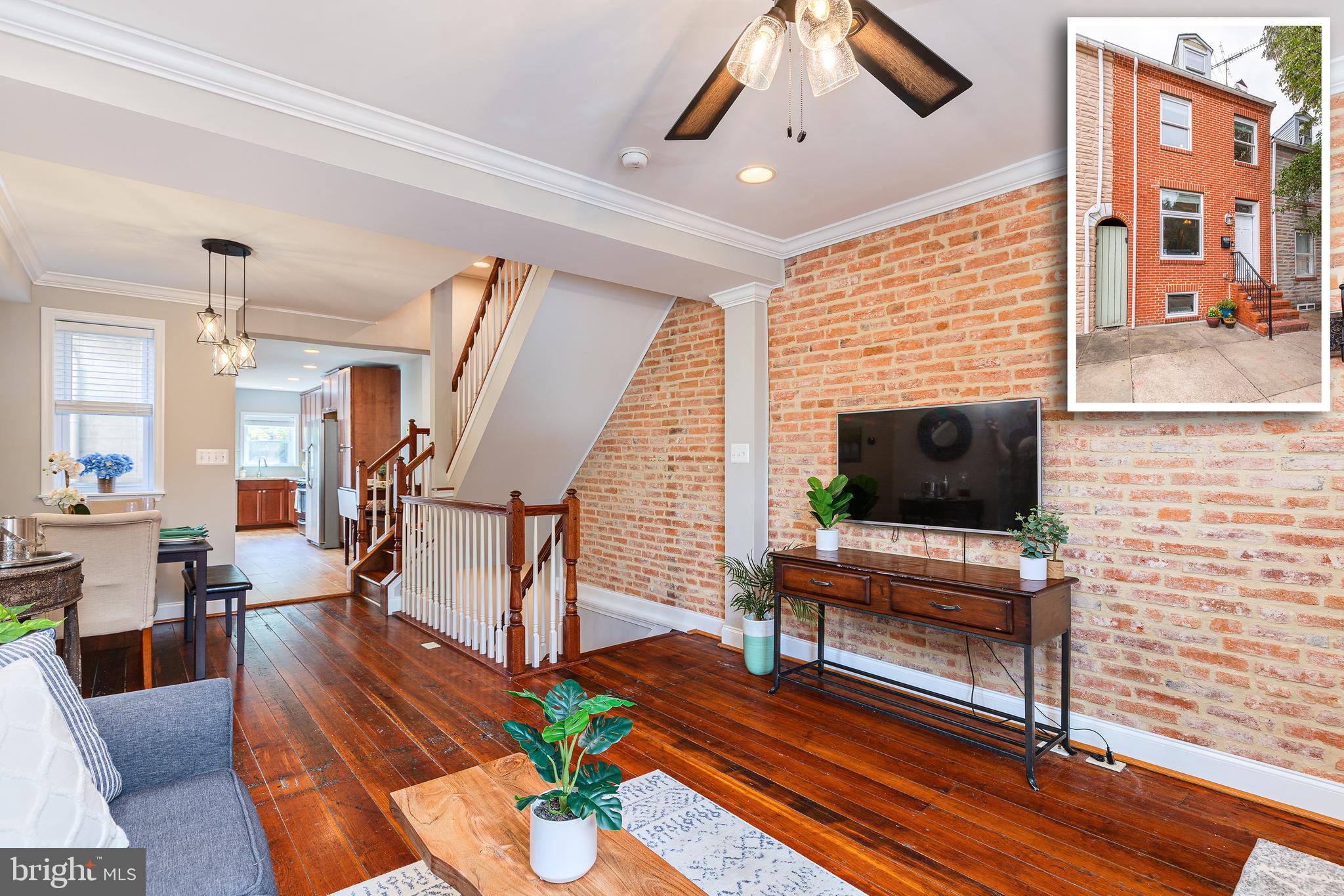 REMARKABLE FELLS POINT HOME W/ 4 FINISHED LEVELS & SPECTACULAR OUTDOOR OASIS - located just steps to all the major Fells Point attractions this 15' wide home features an updated floor plan with original wide plank hardwood floors throughout, fresh paint throughout, crown molding, exposed brick, separate dining area, large kitchen w/ granite countertops, ss appliances, custom cabinetry and new tile backsplash leading to secluded custom stone patio w/ pergola and seasonal ivy great for entertaining.  Perfect for roommates or those needing more space the upper level offers 2 large bedrooms with new carpet, luxurious bathrooms with jetted tubs, oversized walk-in closet in owner suite and 3rd floor clubroom w/ wet bar which makes great home office or second living room leading to large rooftop deck with downtown views.  The finished walk out lower level has two bright bedrooms, hallway bathroom and laundry room.  Well appointed throughout and lives larger than it appears - dual zone hvac system keeps this home comfortable throughout.  Check this one out!