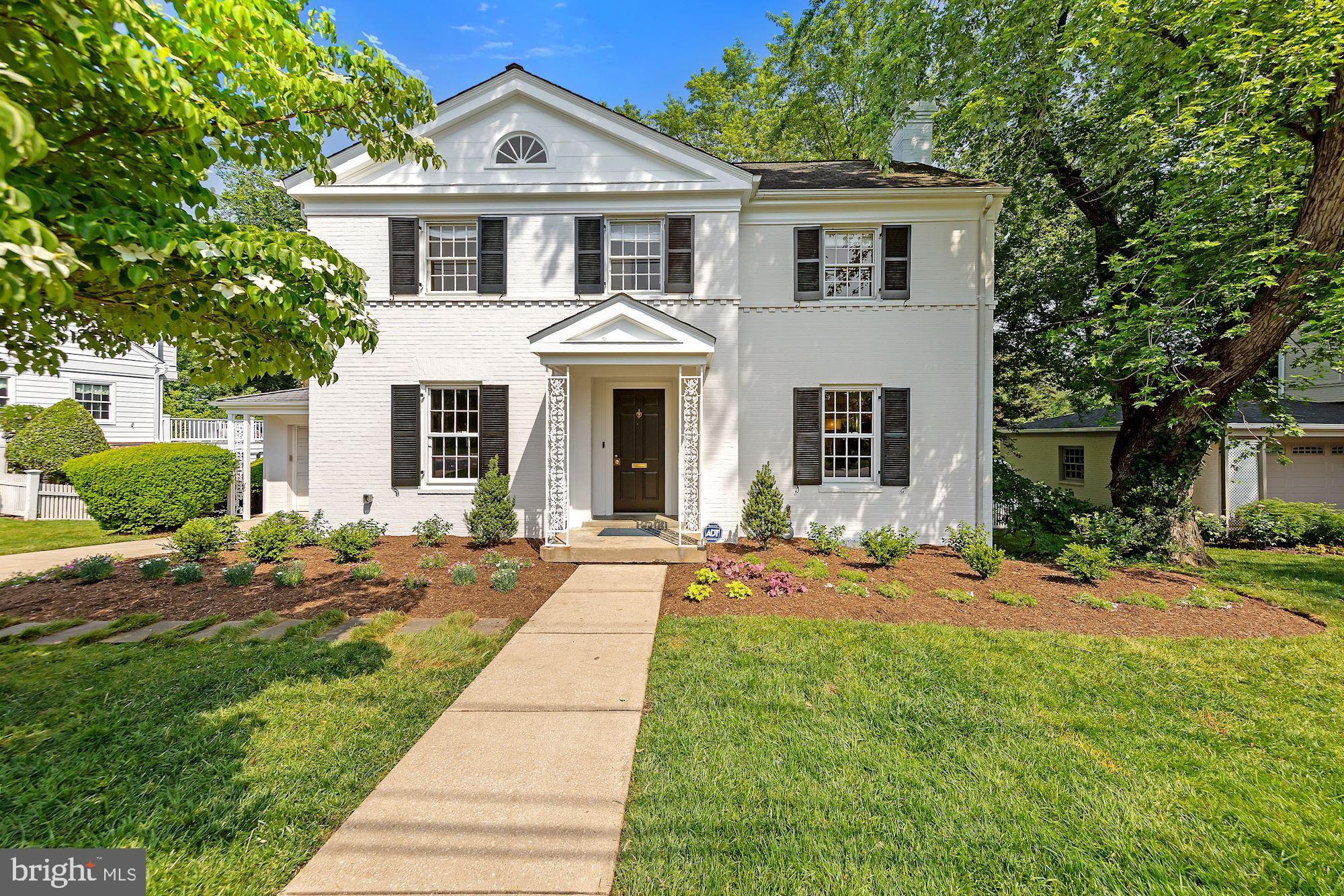 This is the one you have been waiting for!  Beautifully situated in The Hamlet, this classic Chevy Chase colonial checks all the boxes! Four Brothers Design + Build transformed the original upper level floor plan, which now offers four bedrooms and three full baths, with a primary bedroom addition featuring custom walk-in closets and a high-end full primary bath as well as an expanded high-end dual entry hallway bath.  The renovated kitchen offers stainless steel appliances, granite counters, marble tile backsplash and tile floor.  Main level features large  breakfast area and family room running along the back and is completed by a sunny living room, dining room, full bath and foyer, as well as covered access to the patio and garage.  The lower level offers bedroom #5, a half bath, large walkout recreation room to patio and laundry/utility/storage room. The spacious attic is fully insulated and contains a second upper level HVAC system.  The large yard is beautifully landscaped.  Close to Bethesda/Metro/future Purple Line. Too many valuable updates and improvements to list!