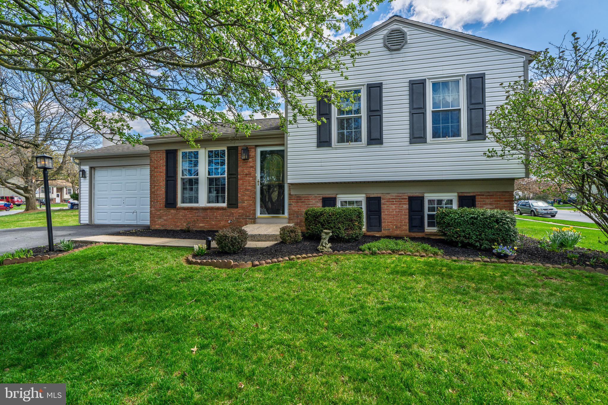 This charming, freshly updated split level home offers a perfect blend of comfort and style. Situated in Manheim Township's popular Village Park neighborhood, it features a bright, open concept living area with new flooring, fresh paint and large windows that flood the space with natural light. The kitchen has been tastefully renovated with brand new butcherblock countertops, stainless-steel appliances and lighting fixtures. The versatile family room addition is highlighted with a vaulted ceiling and a wood stove, perfect for those cold nights.  This large, open space is ideal for family gatherings, relaxing or entertaining. Upstairs you will find the spacious primary bedroom with walk in closet, a second bedroom and a full bath. The lower level provides yet another family room and the third bedroom. The laundry and half bath can also be found in the lower level- the bathroom has plumbing in place to easily convert to a full bath by adding a shower. Outside, a nicely landscaped lot and rear deck make for easy outdoor living. Move-in ready, this home is perfect for those seeking both comfort and convenience. The sidewalk lined neighborhood provides easy access to Manheim Township Park and Weaver Field, just steps away. Schedule your visit before it's too late!