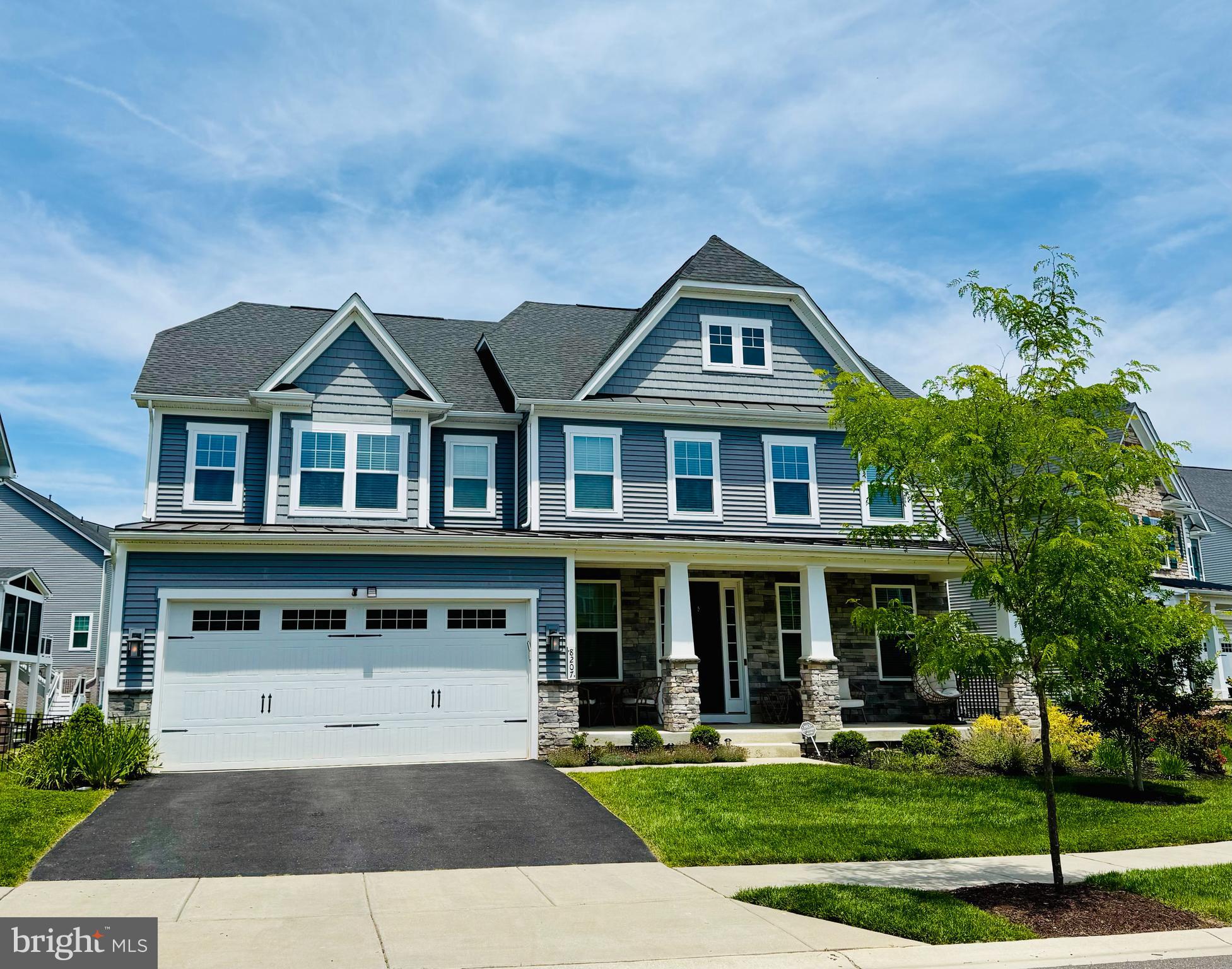 8207 Timeless Court is a stunning 5 bedroom, 4.5 bath home in the highly sought-after Maple Lawn South community. Offering more than 5,300 square feet of luxury living space, this Longwood model backs to one of the community’s coveted open spaces. Highlights include bright white kitchen cabinetry, modern LVP flooring, custom screened-in porch with fireplace, outdoor patio with built-in grill, custom basement bar, and custom main-level built-in cabinetry. Listed and under contract simultaneously.