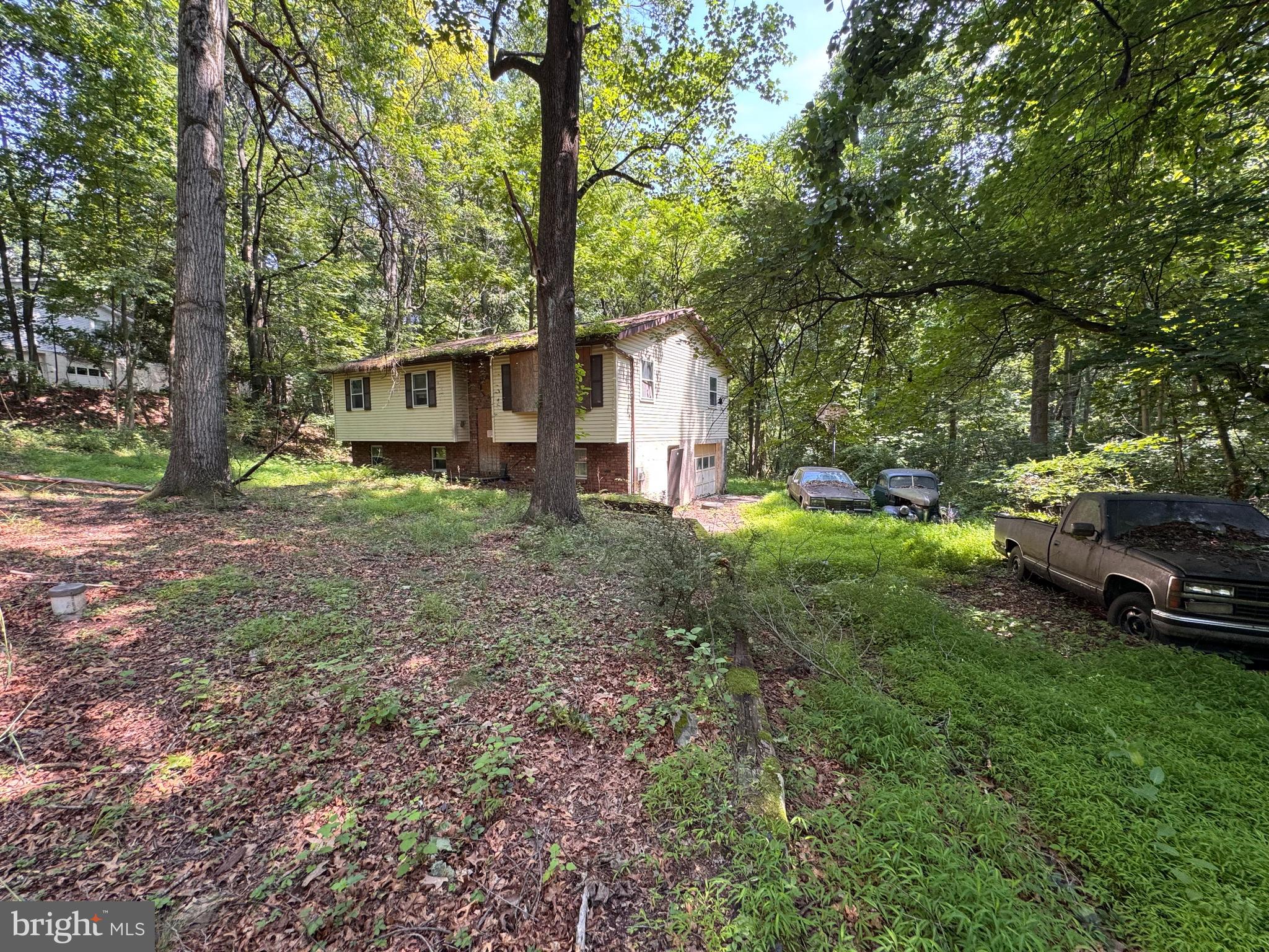 Great opportunity to rebuild on a beautiful 3+  acre lot in Twin Valley schools.  

***Please do not attempt to walk on the property without permission, house has been condemned***

House has foundation and can be rebuilt but since fire can not be lived in.  Septic and well already in! Bring your vision for a beautiful home on a great property.